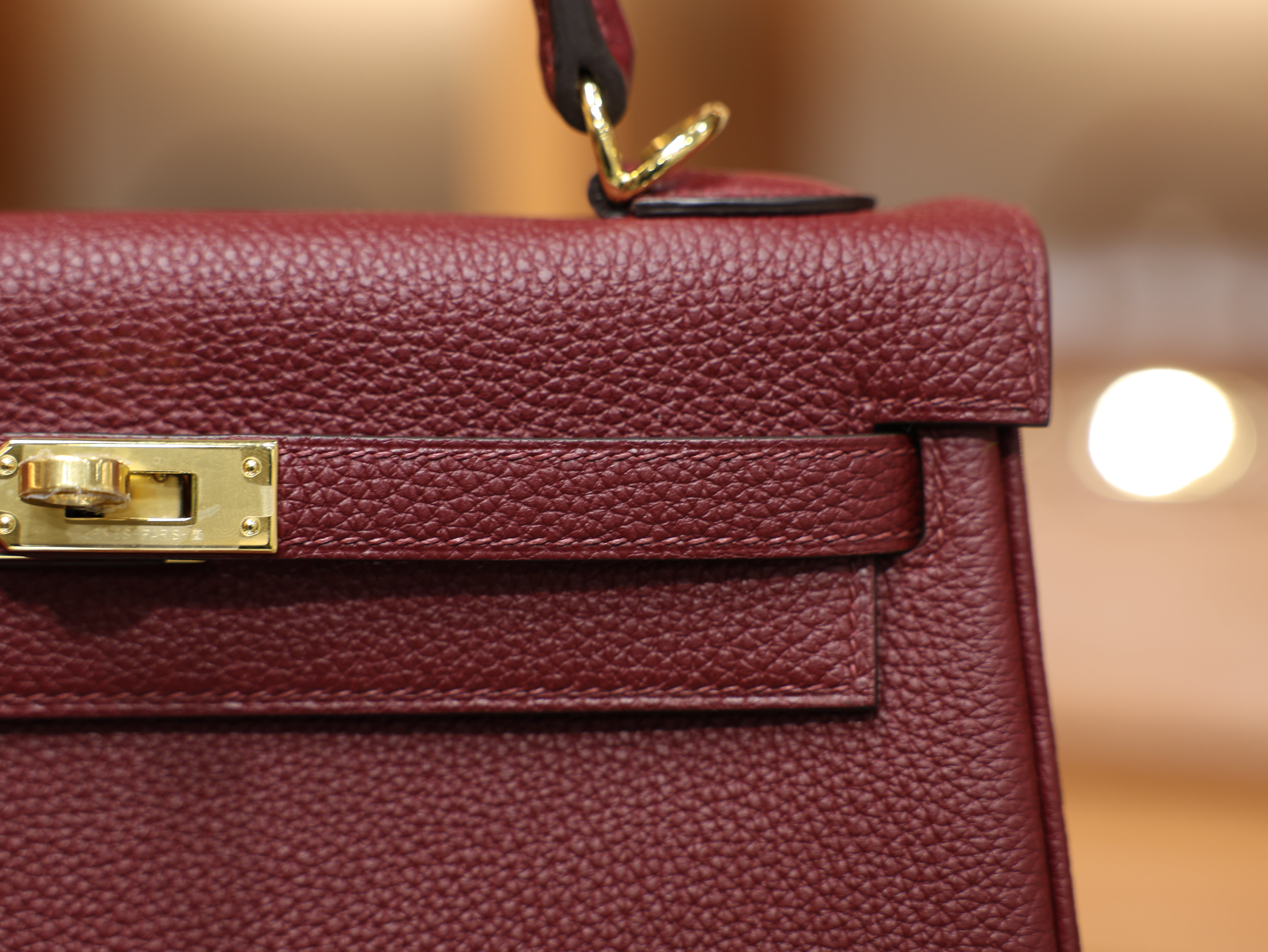 Kelly 25 togo rouge H GHW