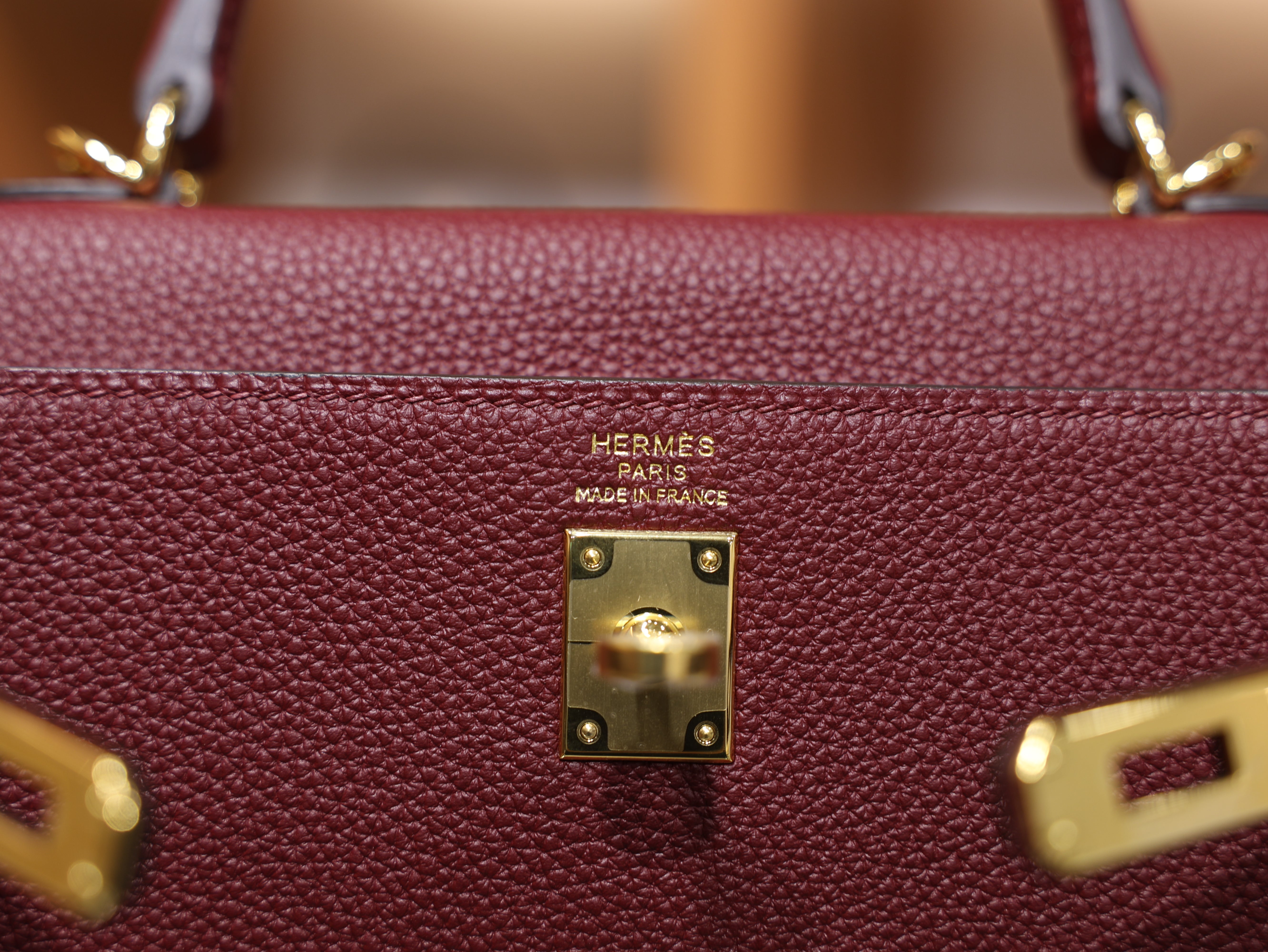 Kelly 25 togo rouge H GHW