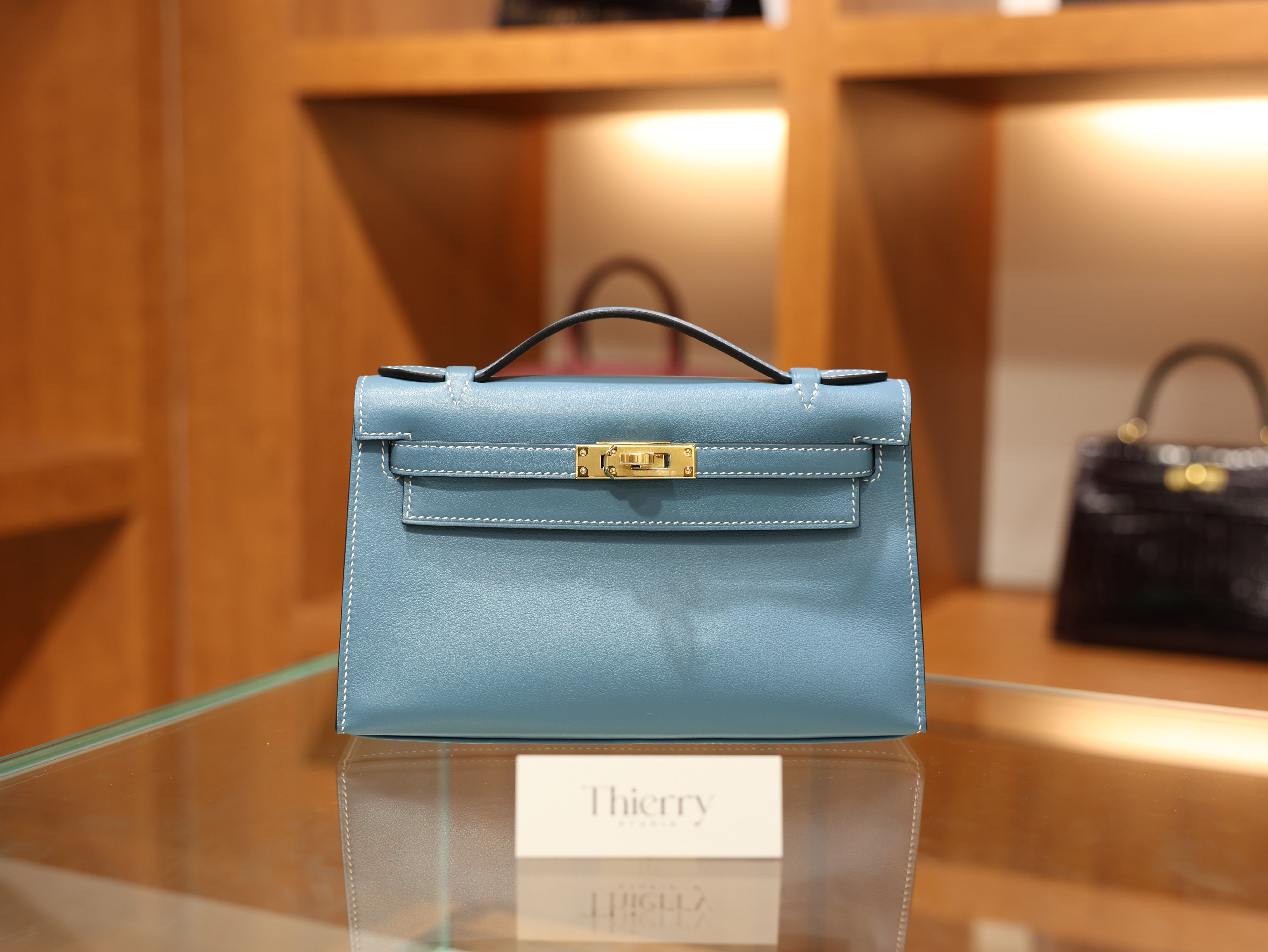 Kelly pochette swift new blue jean GHW