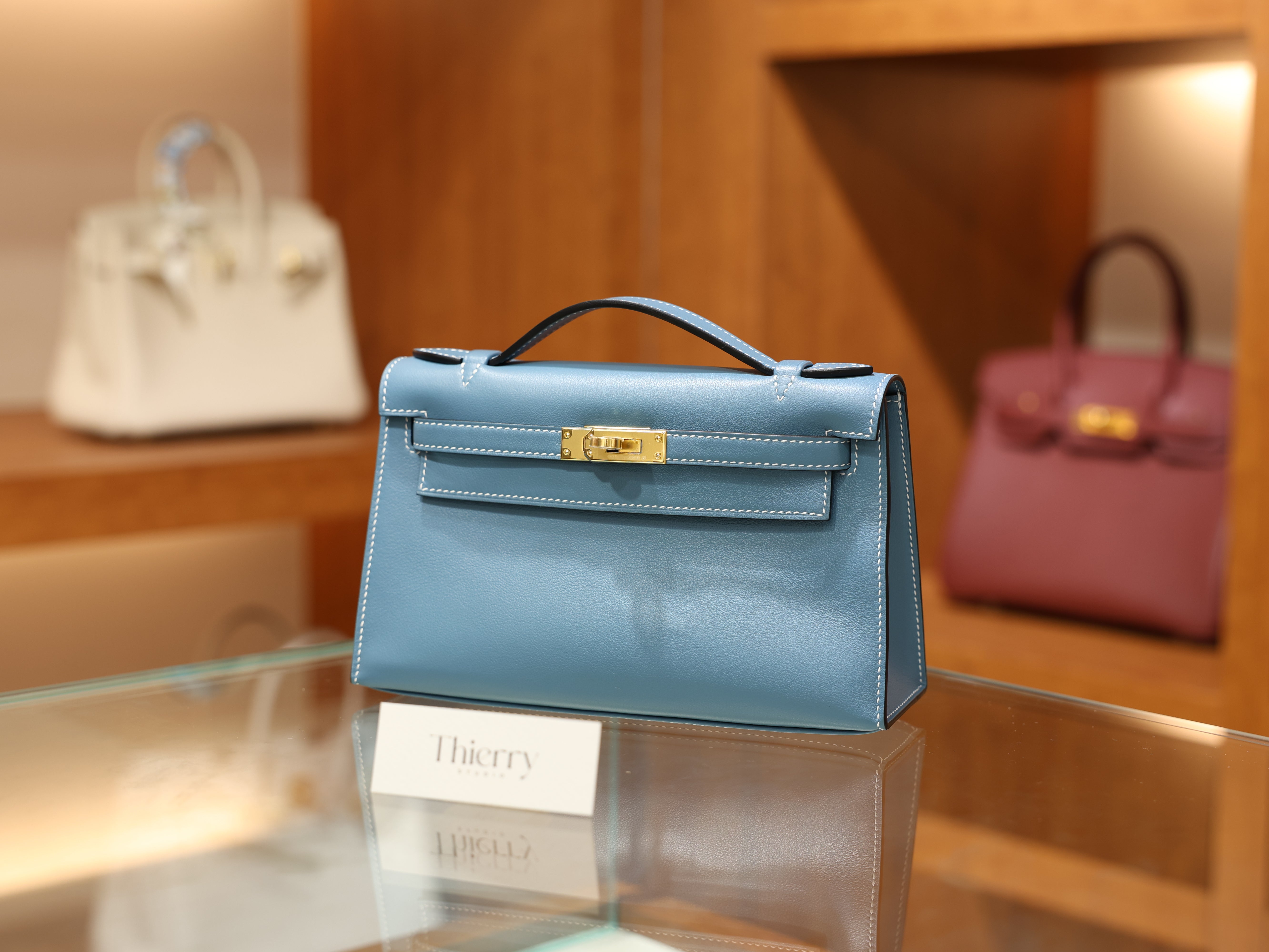 Kelly pochette swift new blue jean GHW