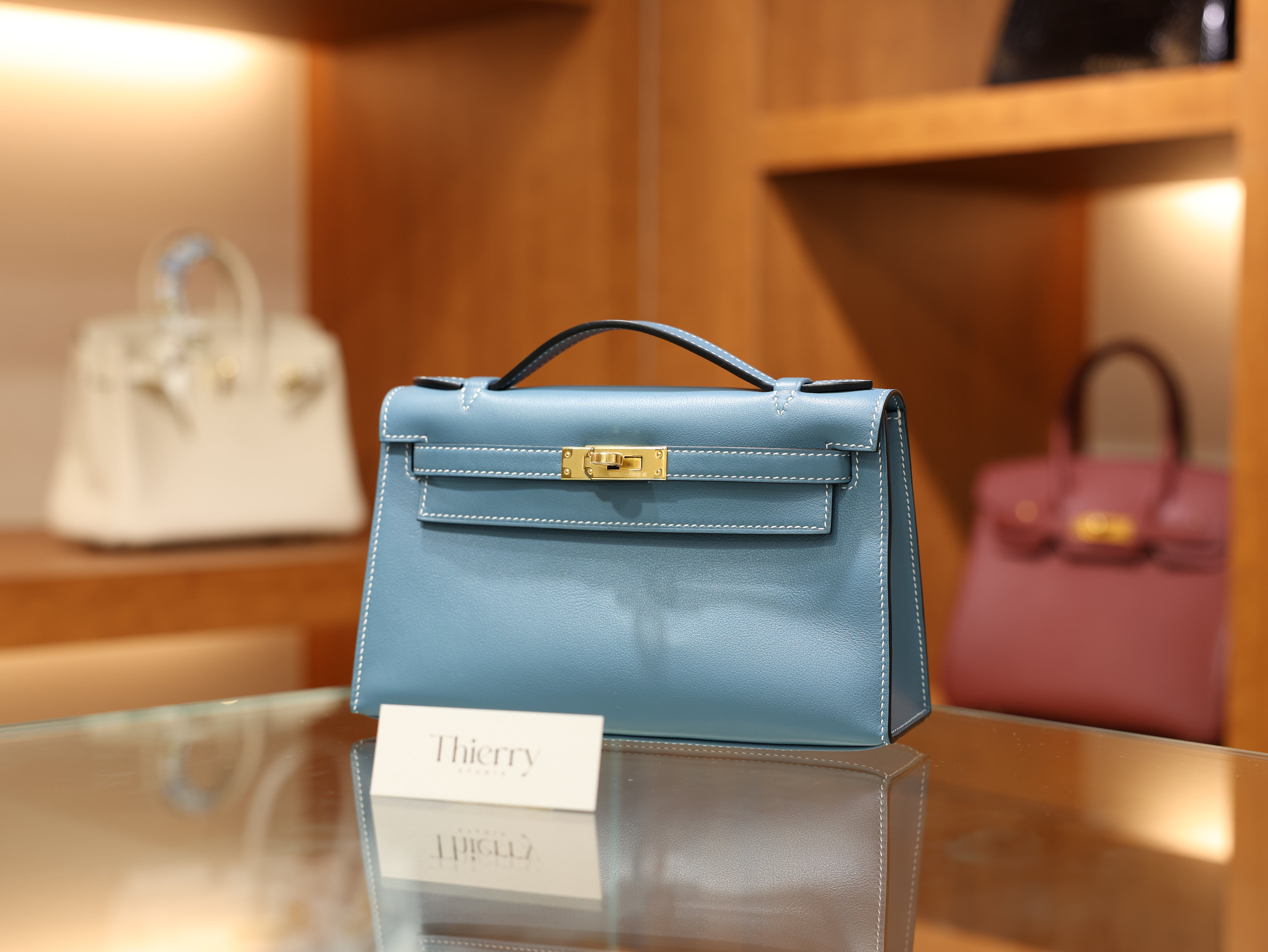 Kelly pochette swift new blue jean GHW