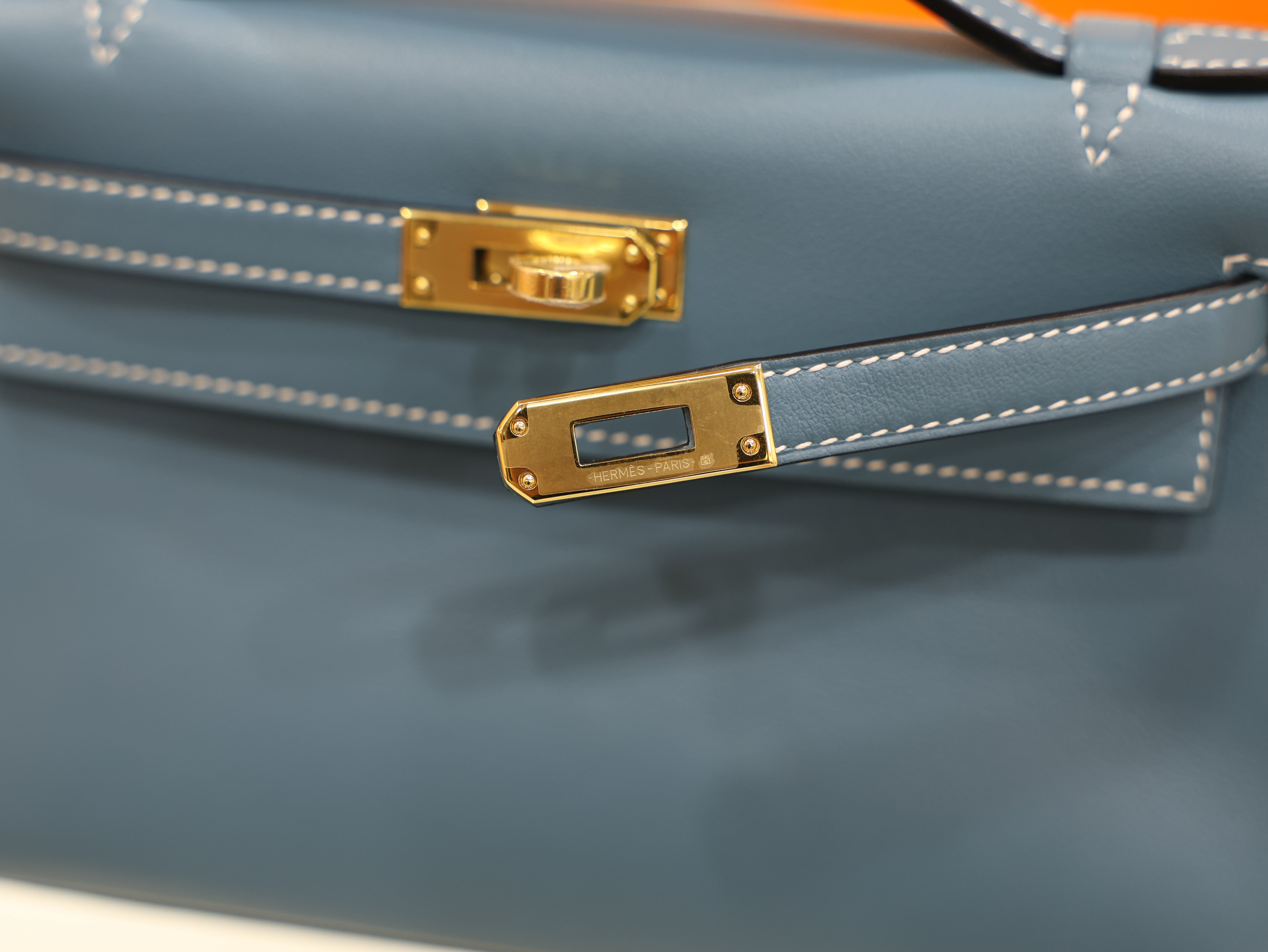 Kelly pochette swift new blue jean GHW