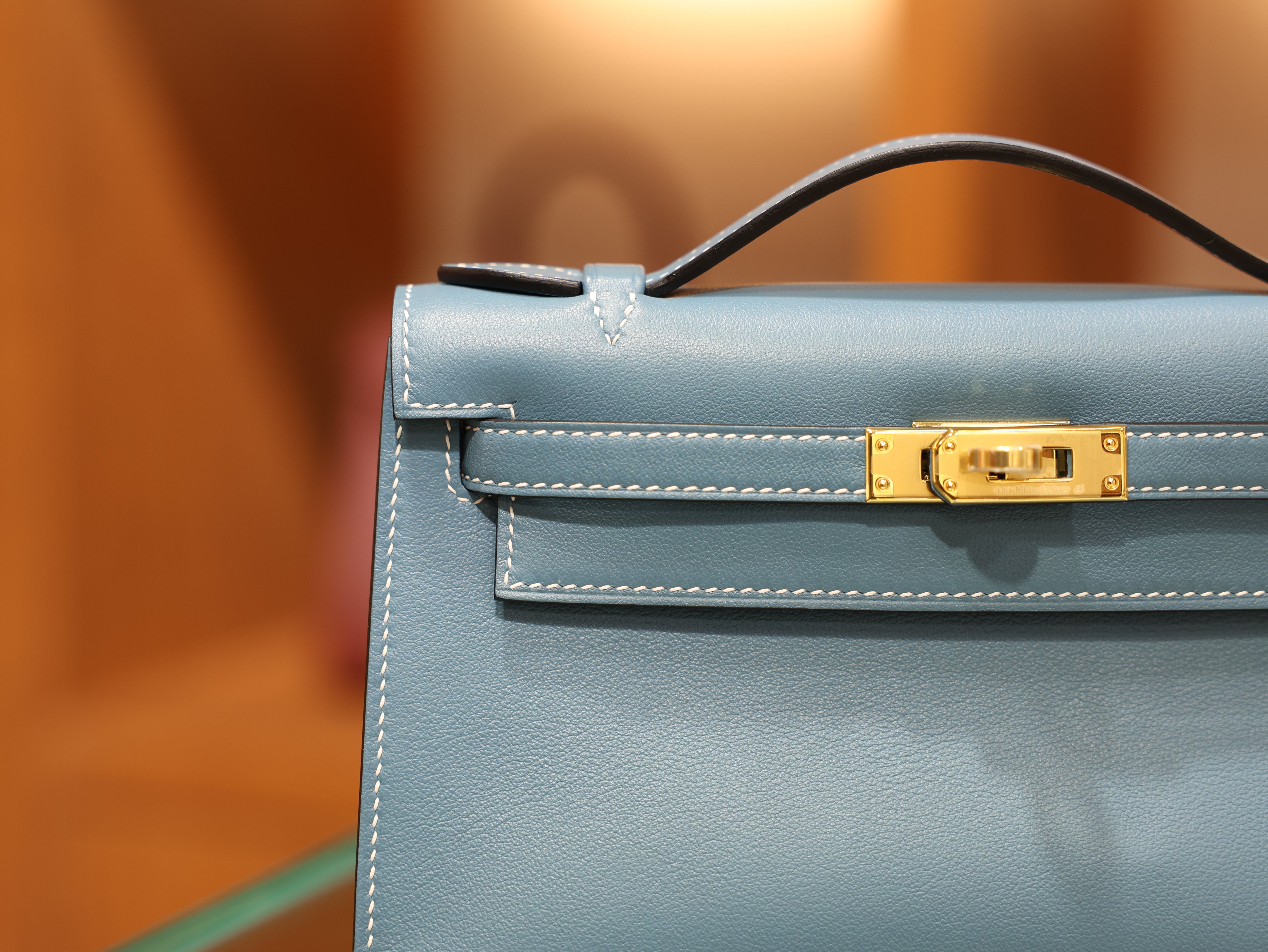 Kelly pochette swift new blue jean GHW