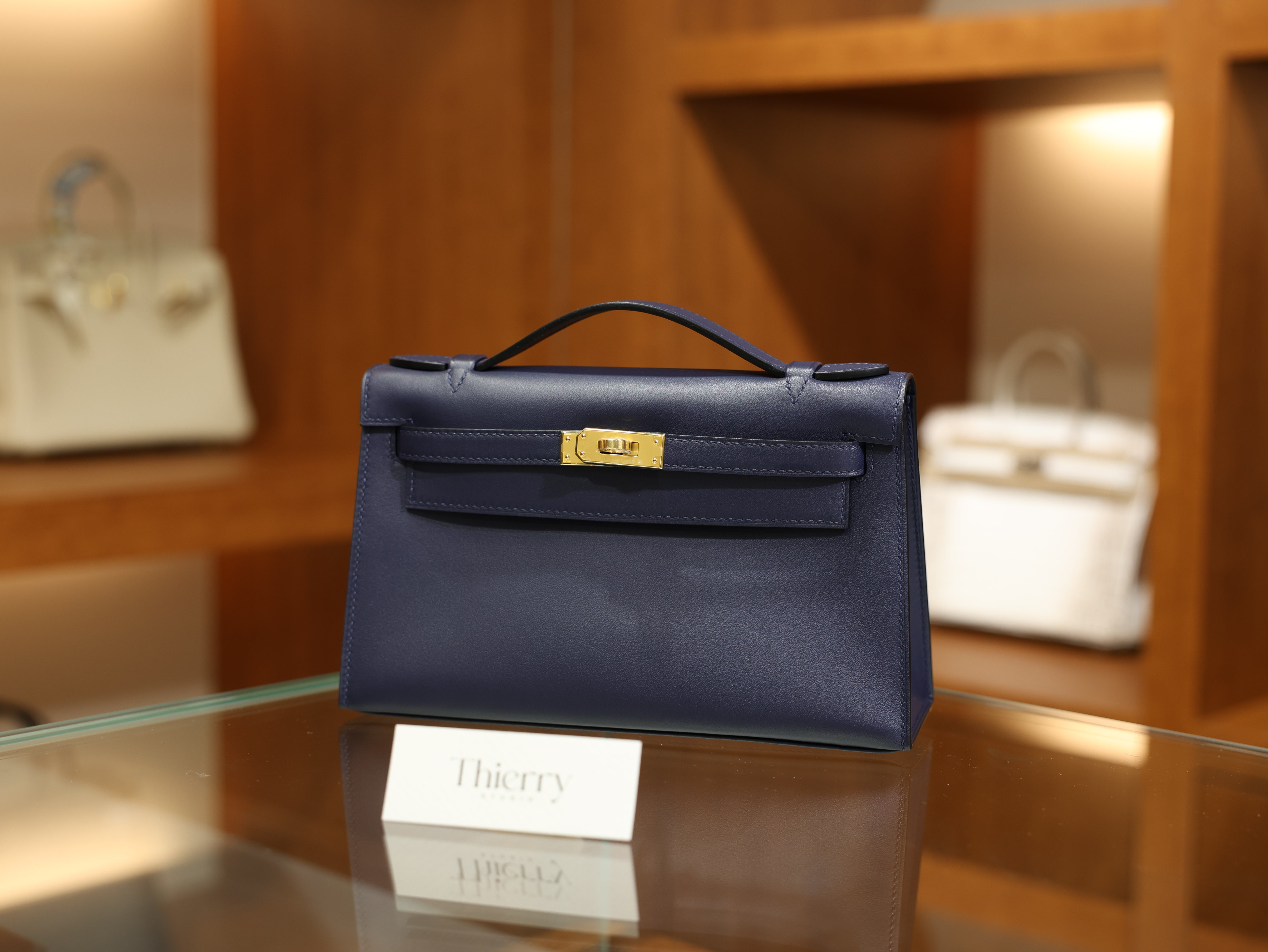 Kelly pochette swift bleu saphir GHW