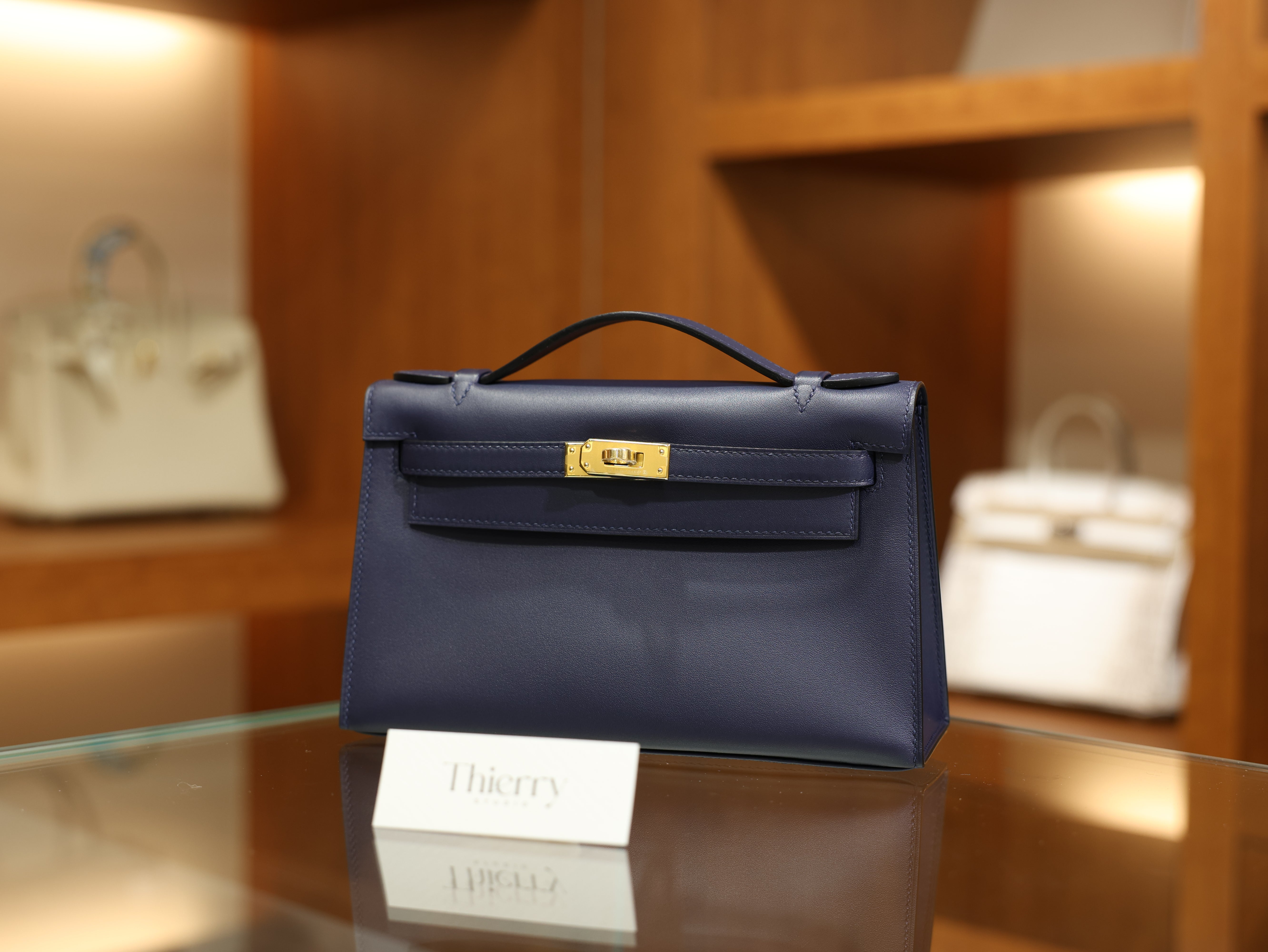 Kelly pochette swift bleu saphir GHW