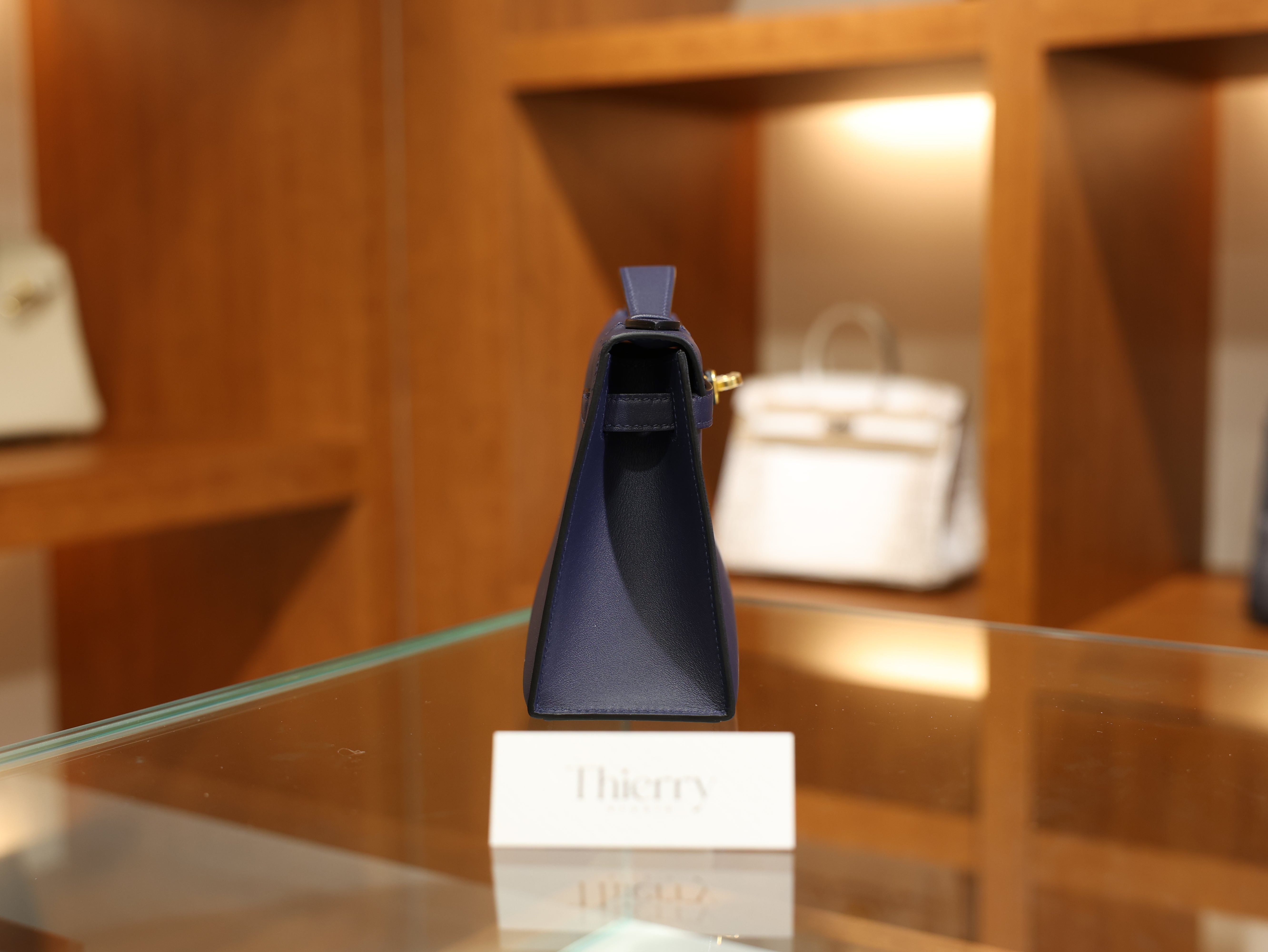 Kelly pochette swift bleu saphir GHW
