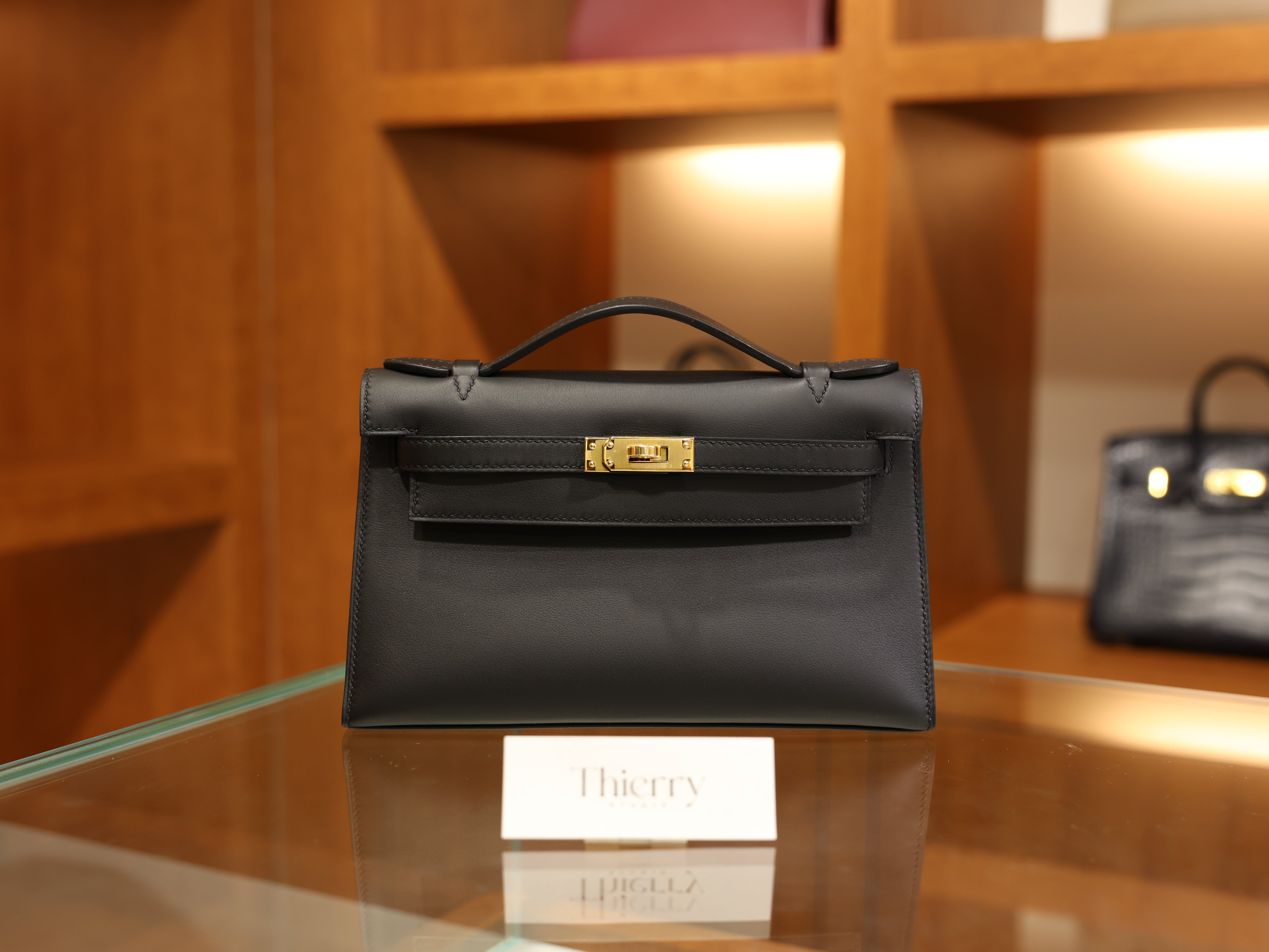 Kelly pochette swift black GHW