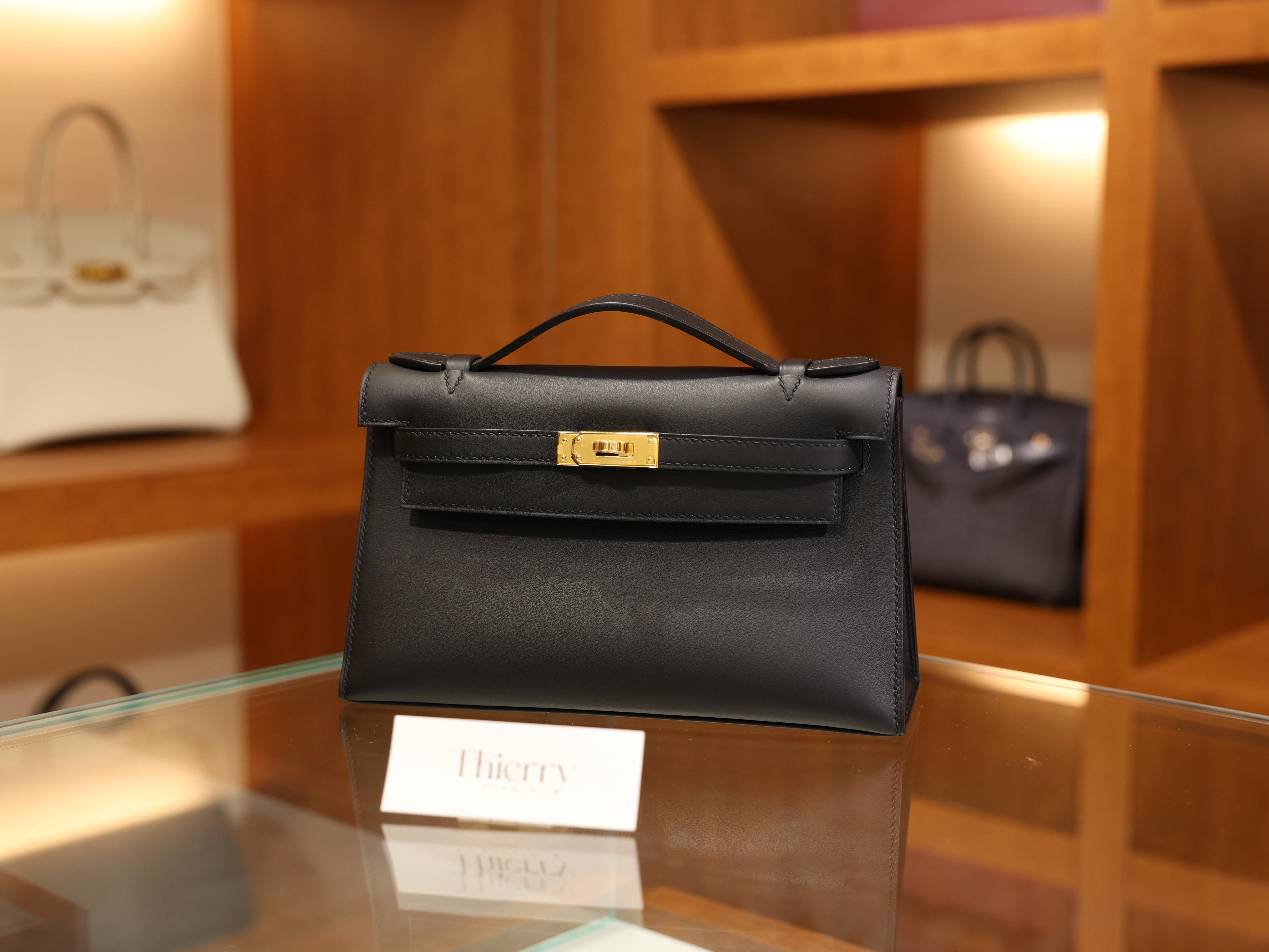 Kelly pochette swift black GHW