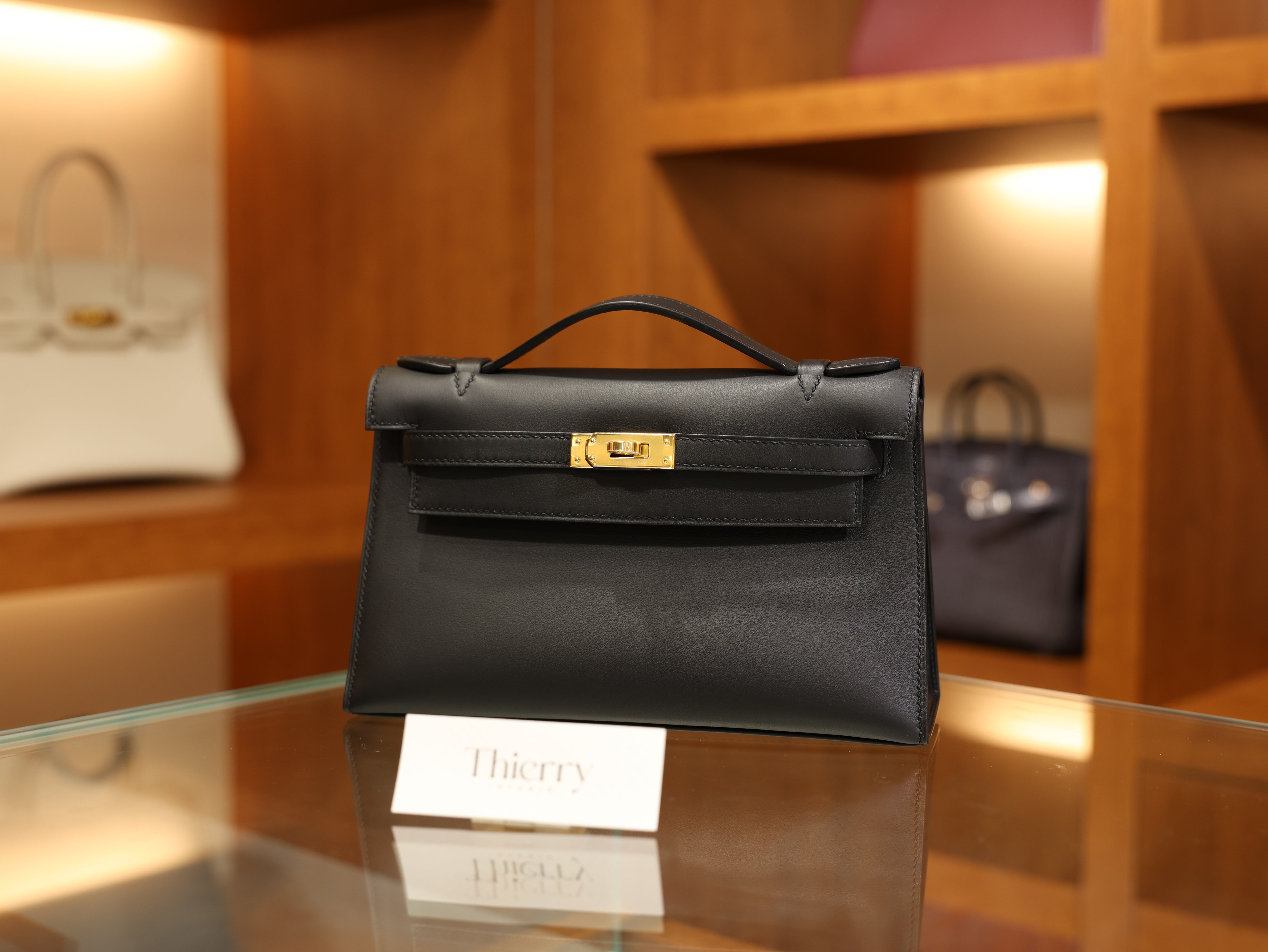 Kelly pochette swift black GHW