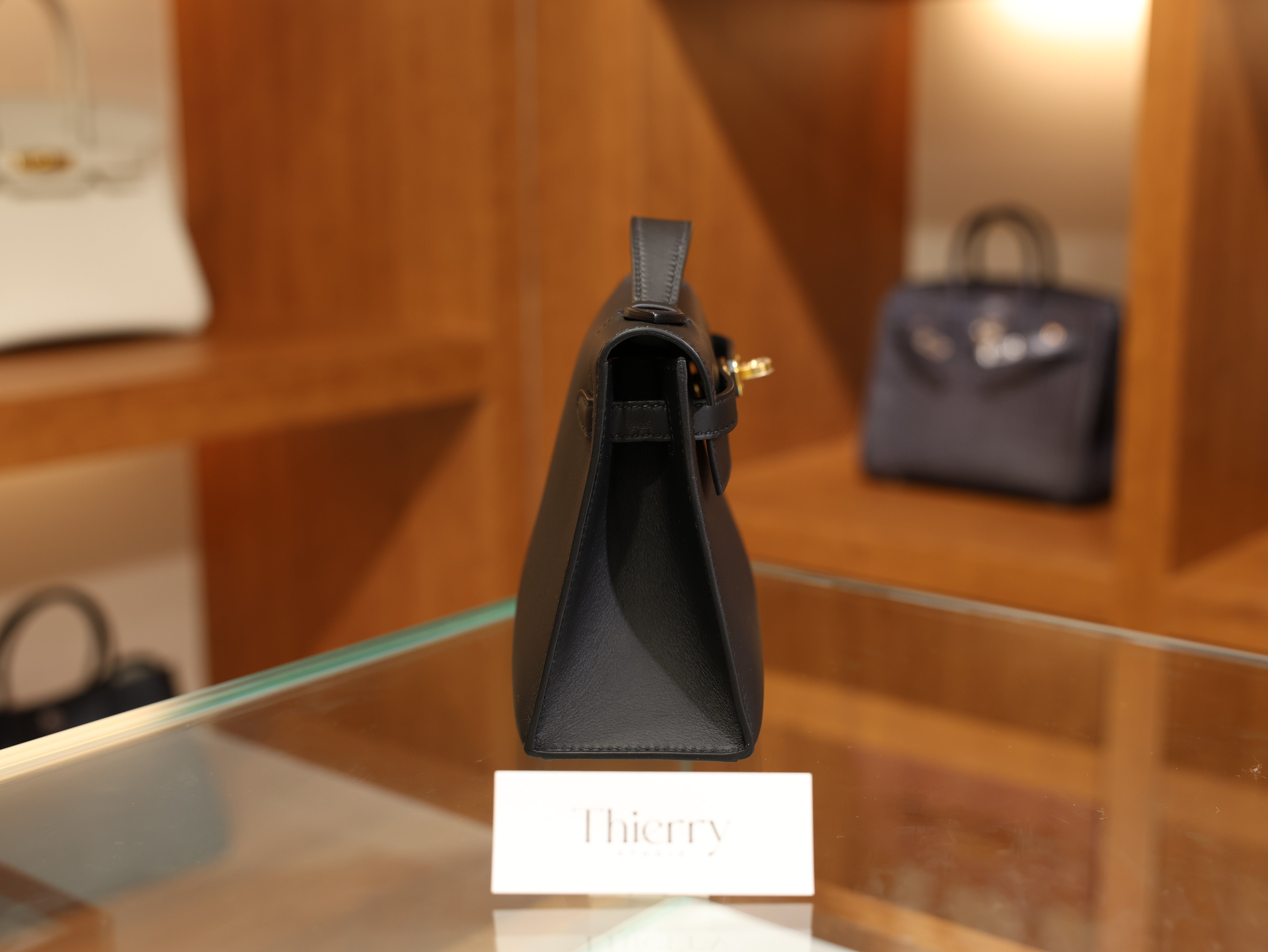 Kelly pochette swift black GHW