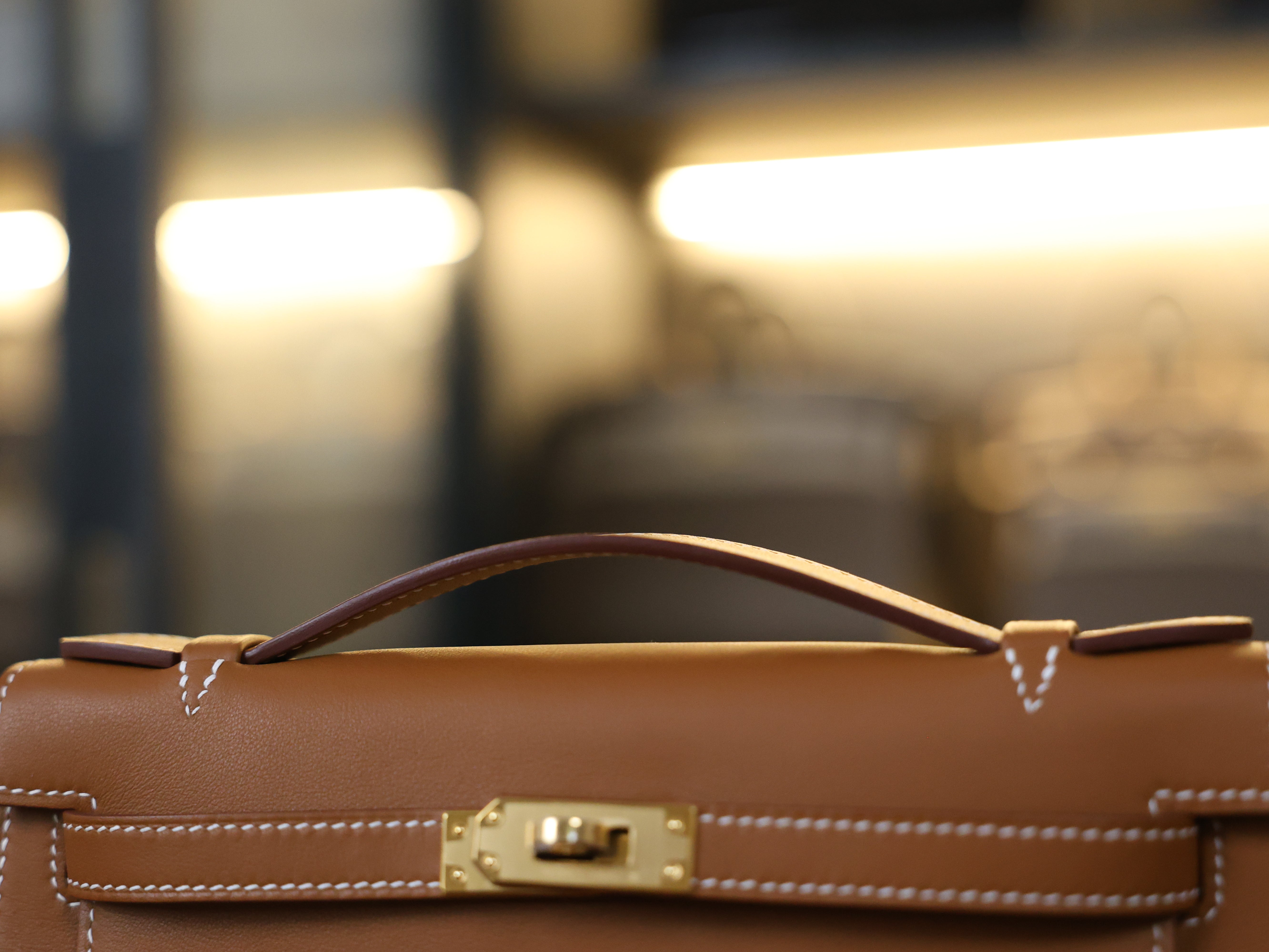 Kelly pochette swift gold GHW