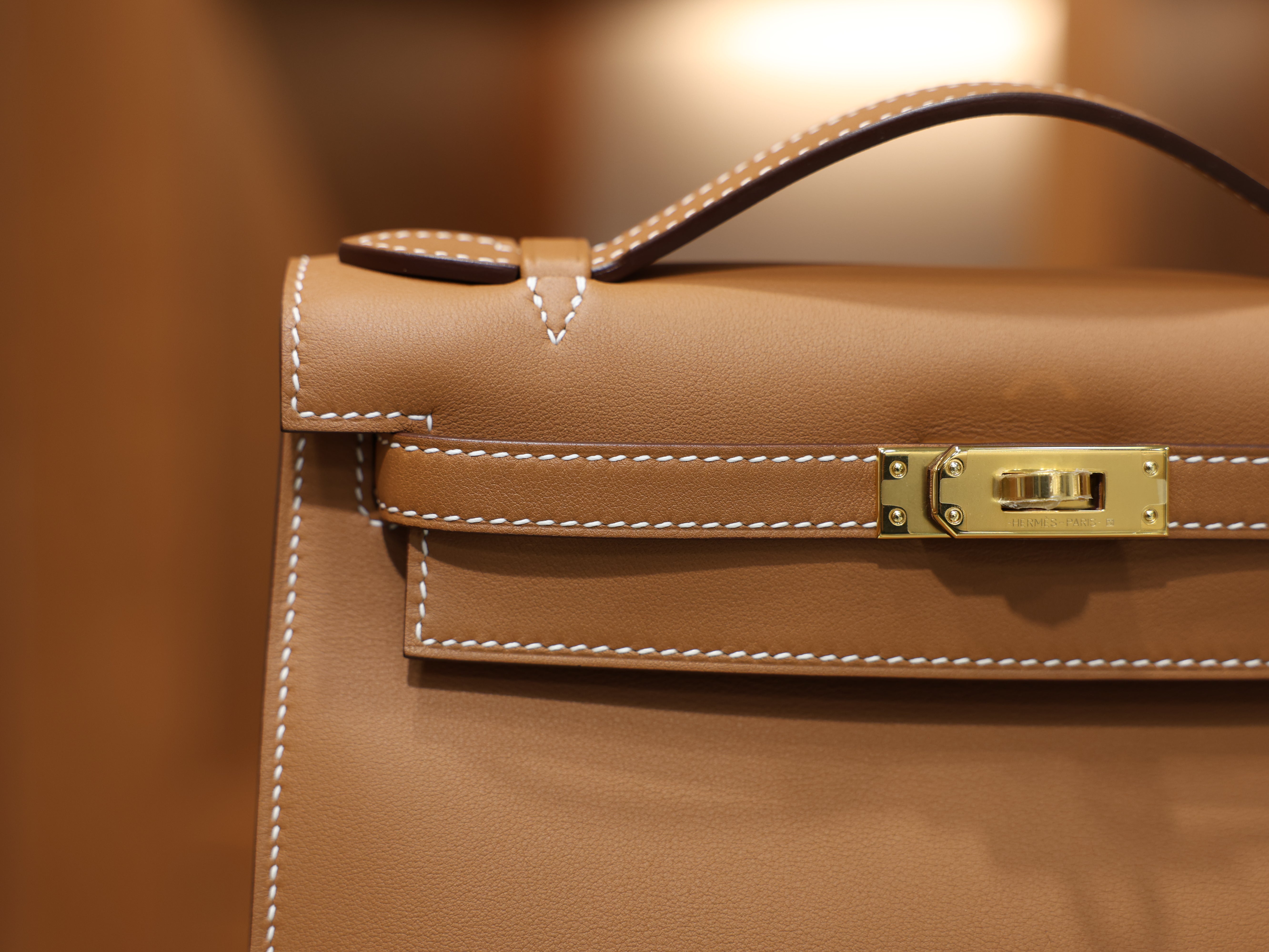 Kelly pochette swift gold GHW