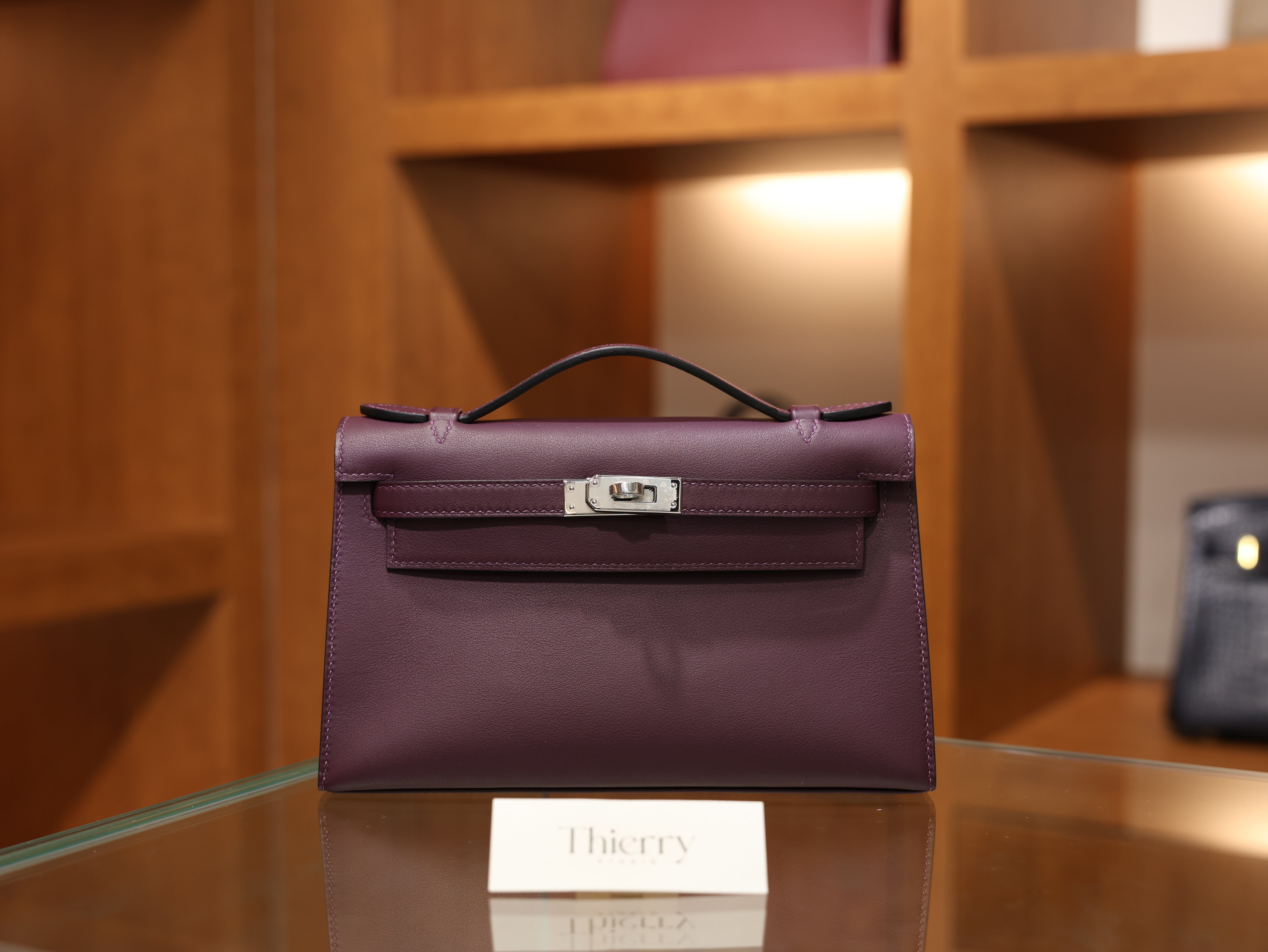 Kelly pochette swift casis PHW