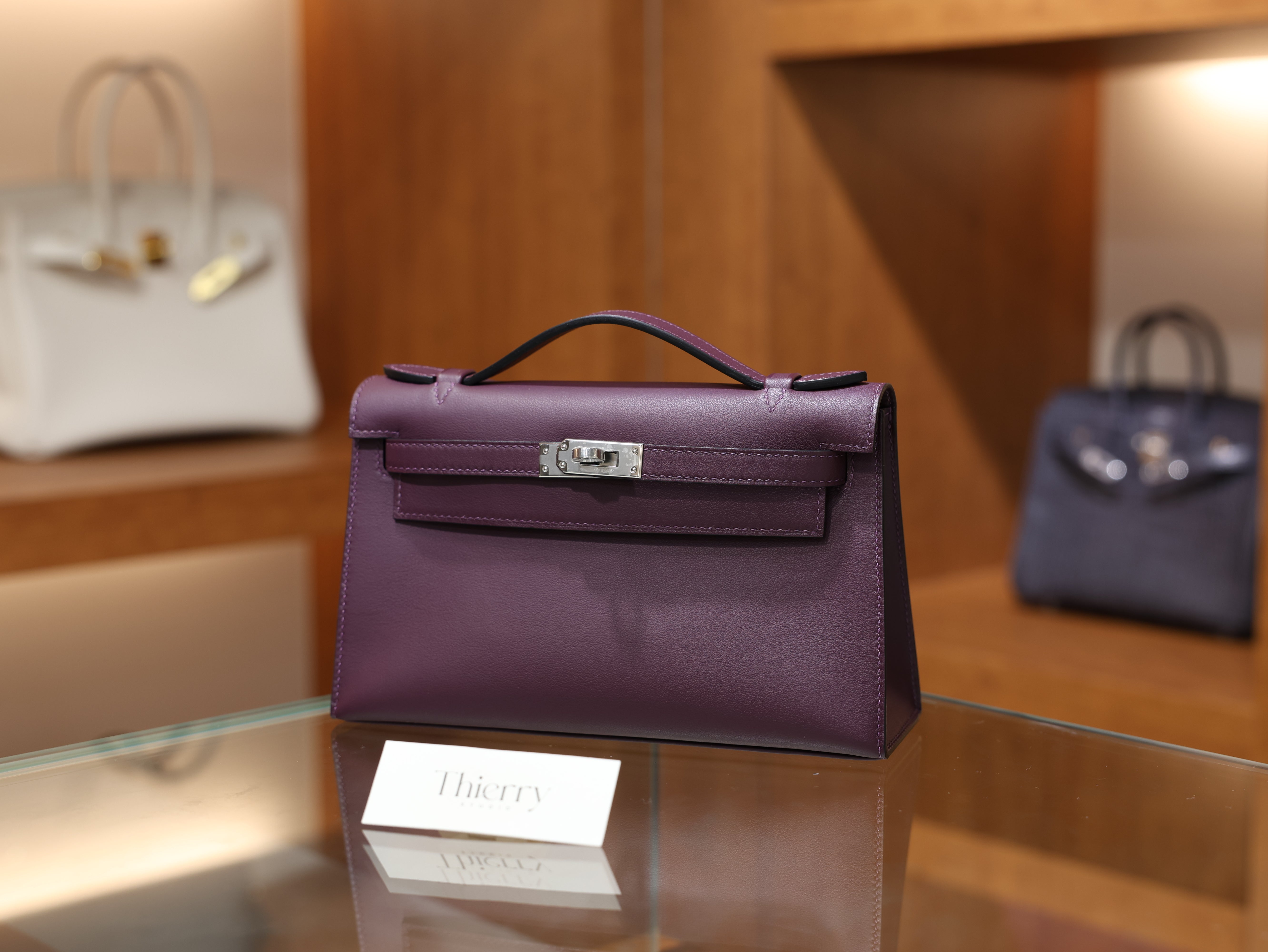 Kelly pochette swift casis PHW