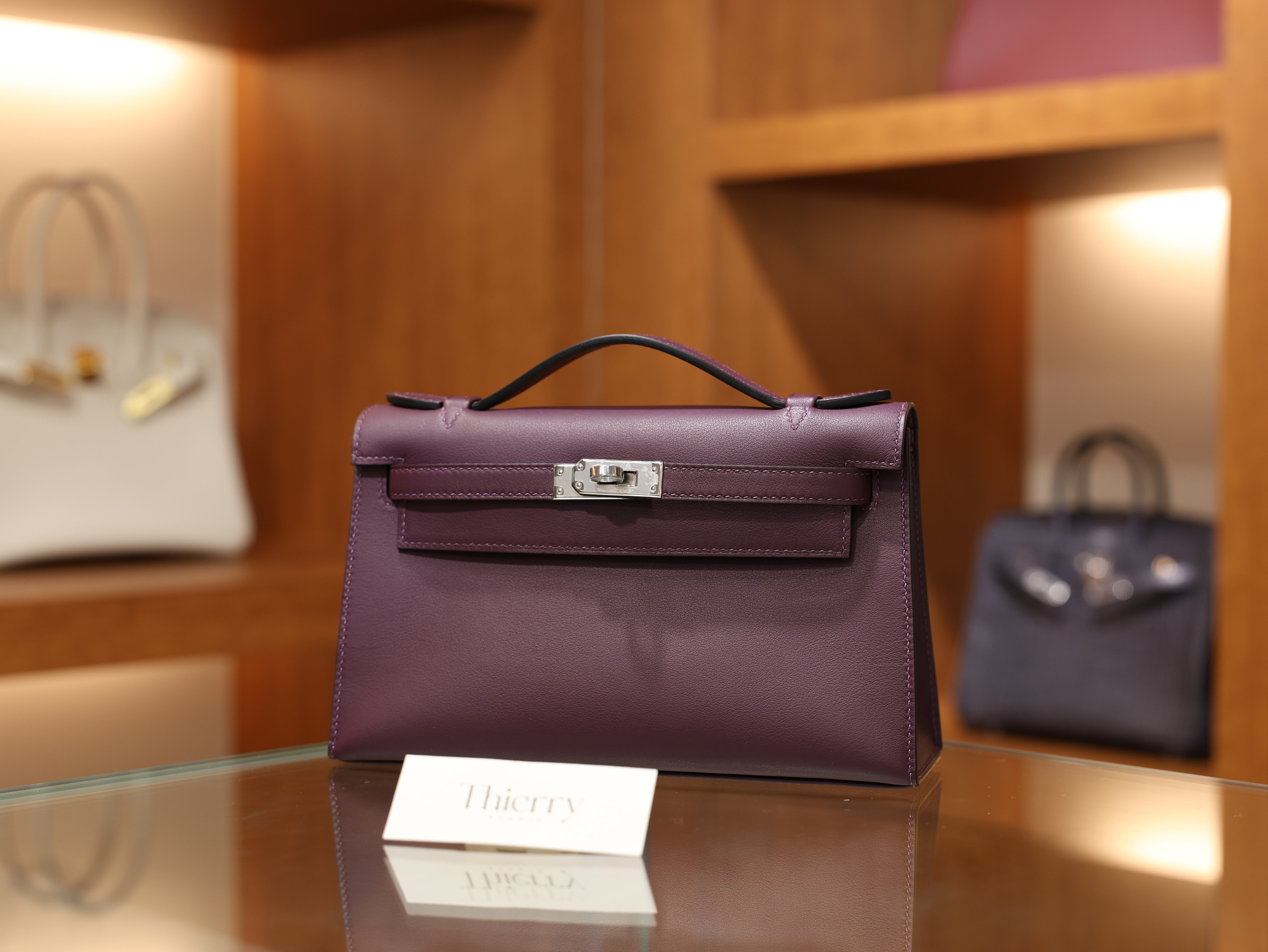 Kelly pochette swift casis PHW