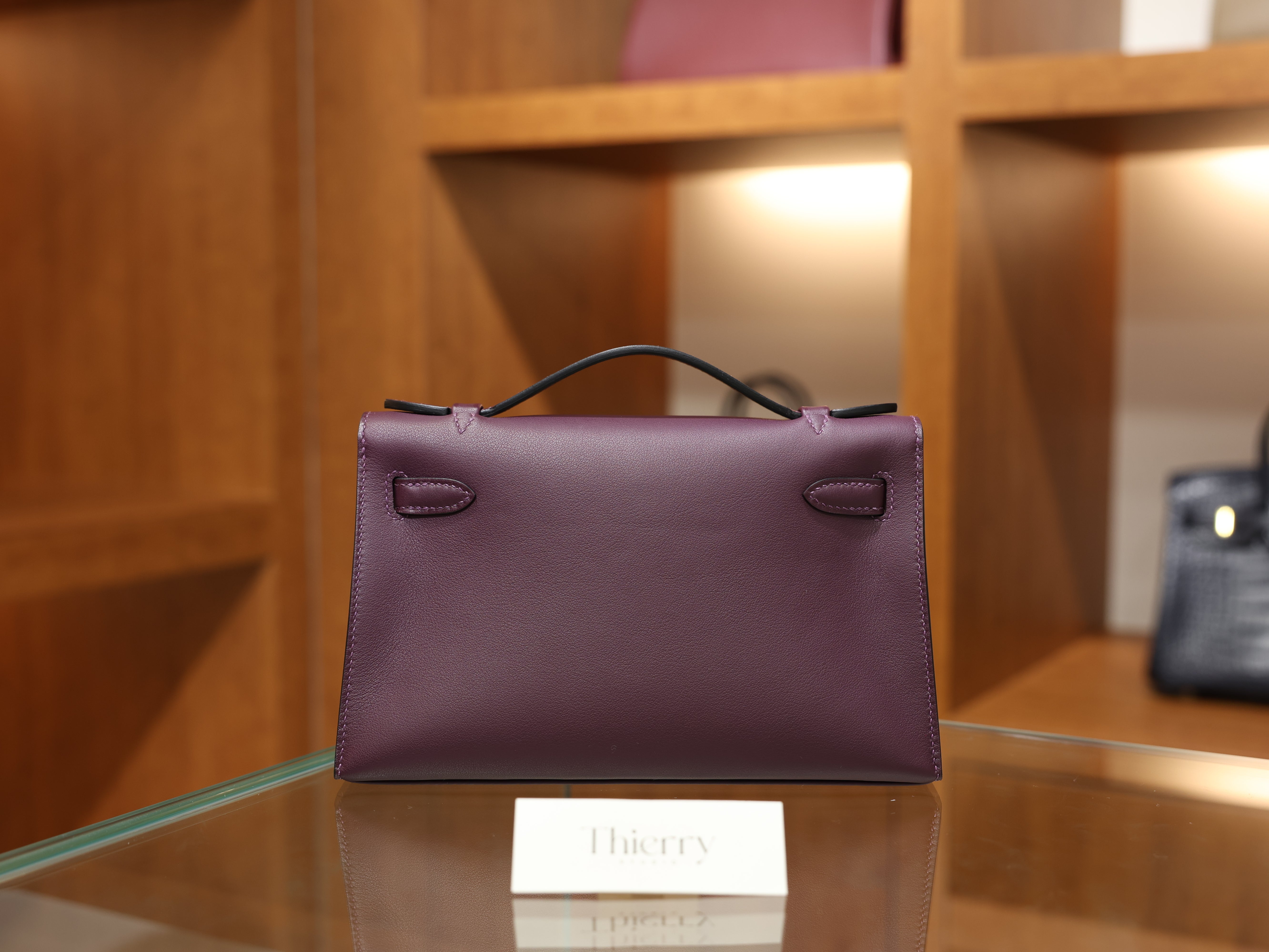 Kelly pochette swift casis PHW