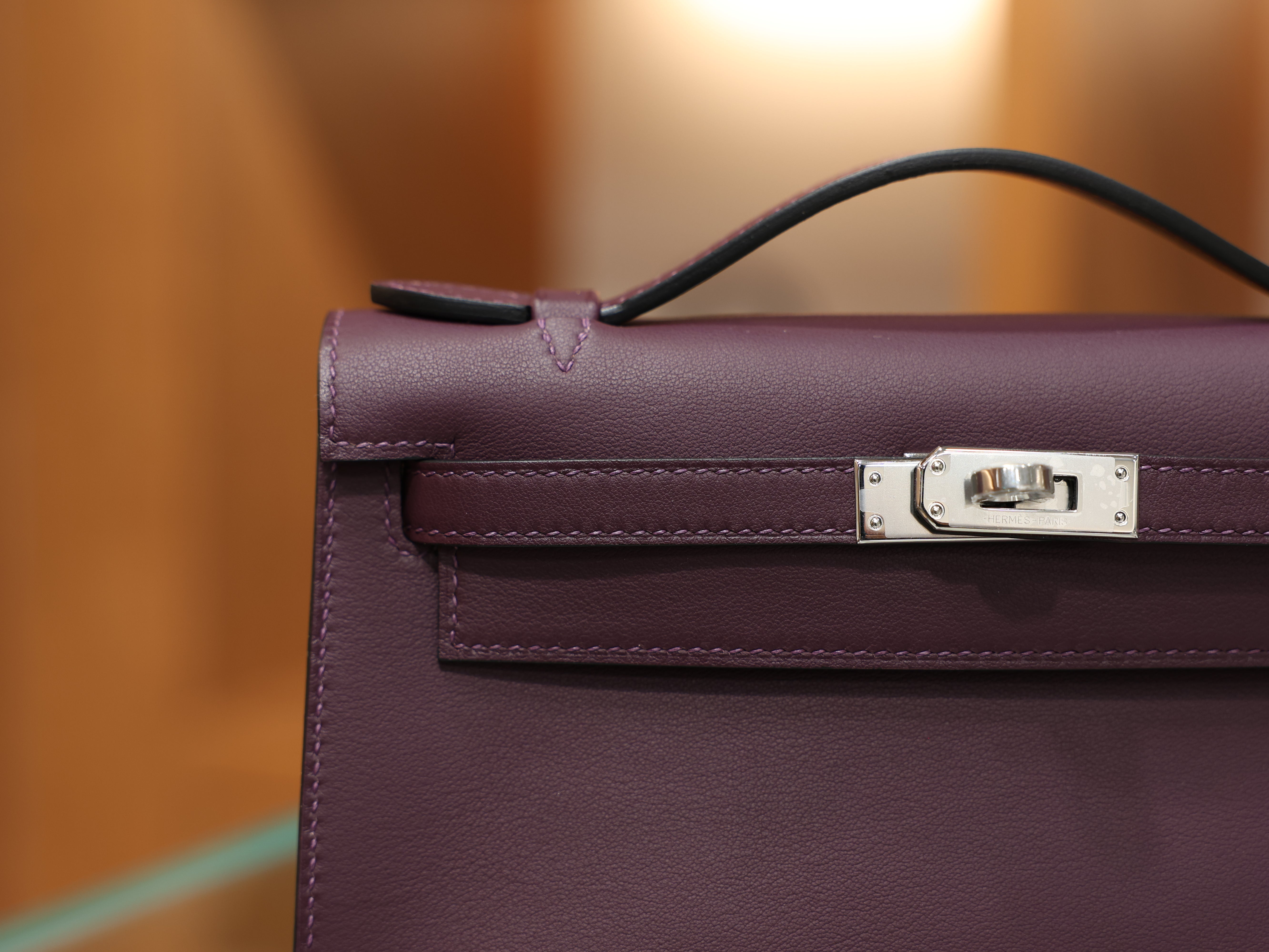 Kelly pochette swift casis PHW