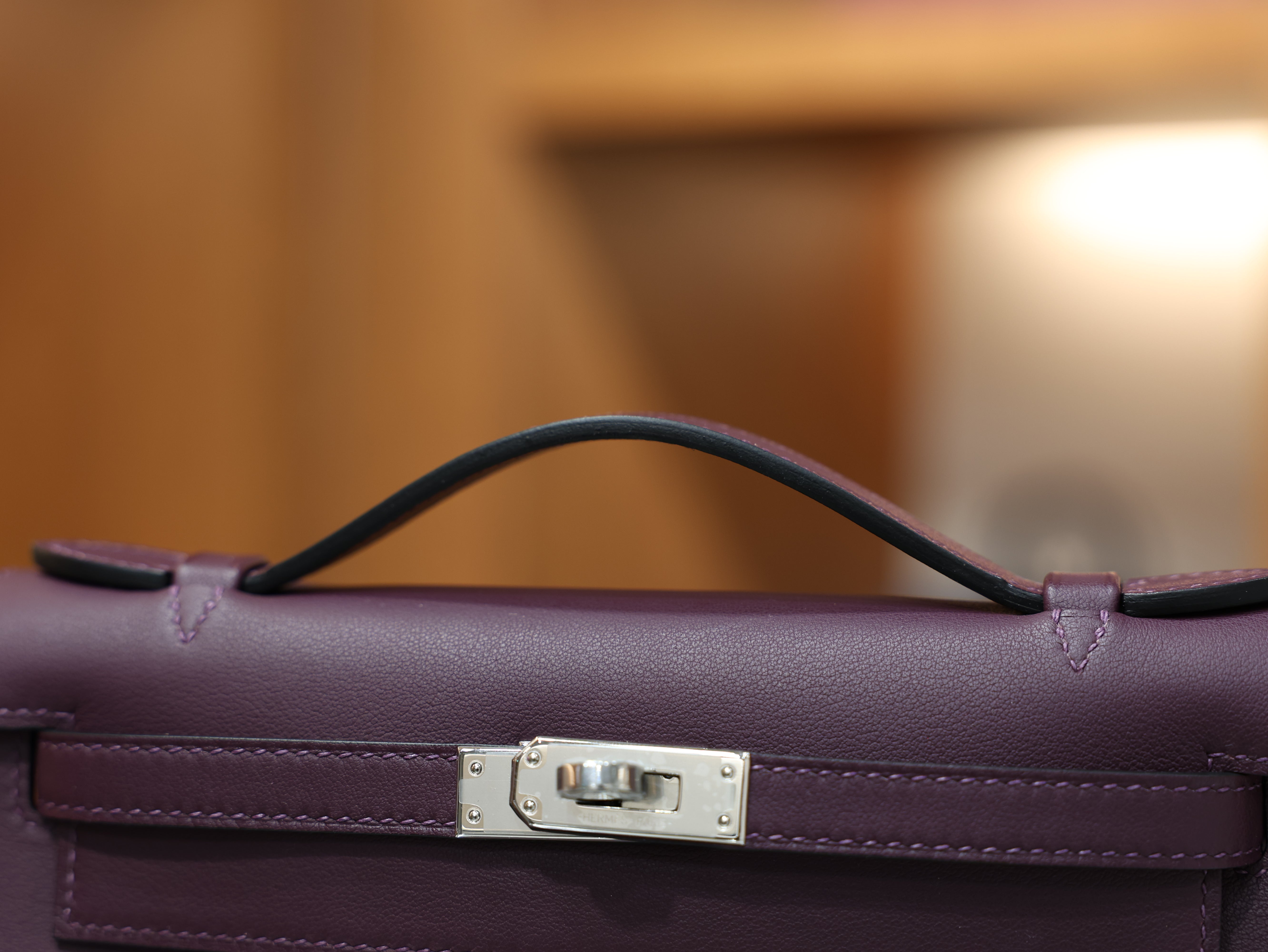 Kelly pochette swift casis PHW