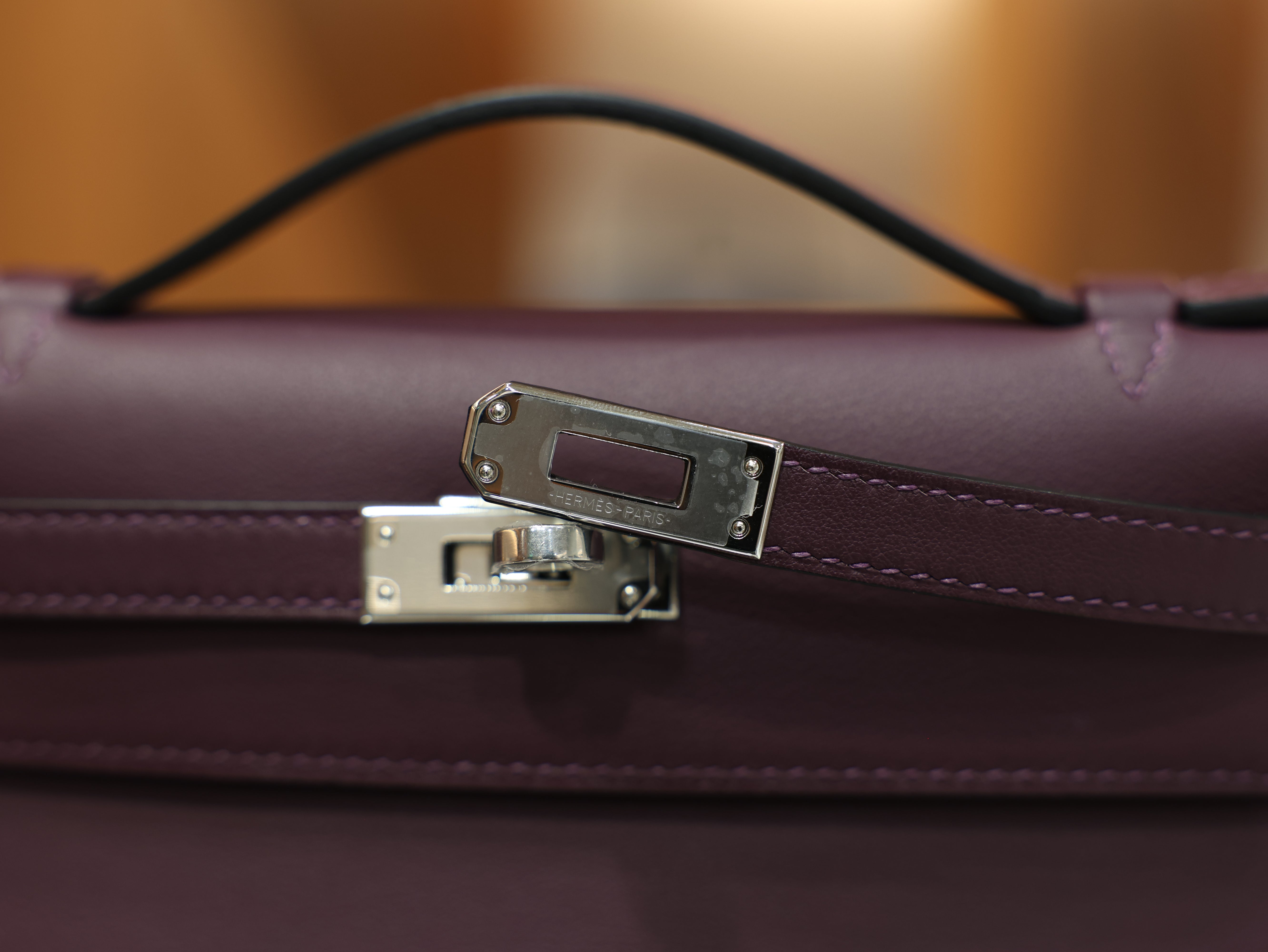 Kelly pochette swift casis PHW