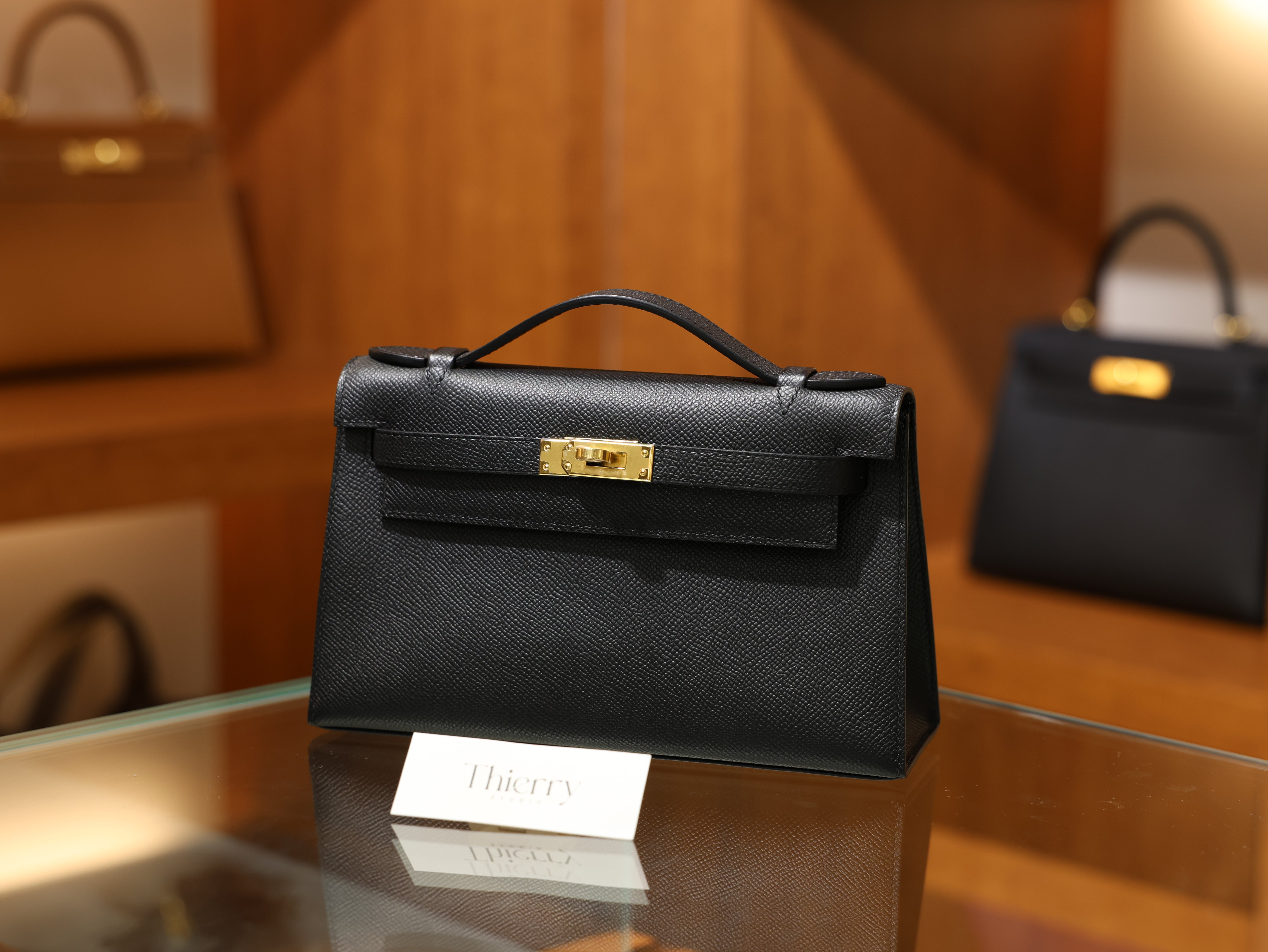 Kelly pochette epsom black GHW