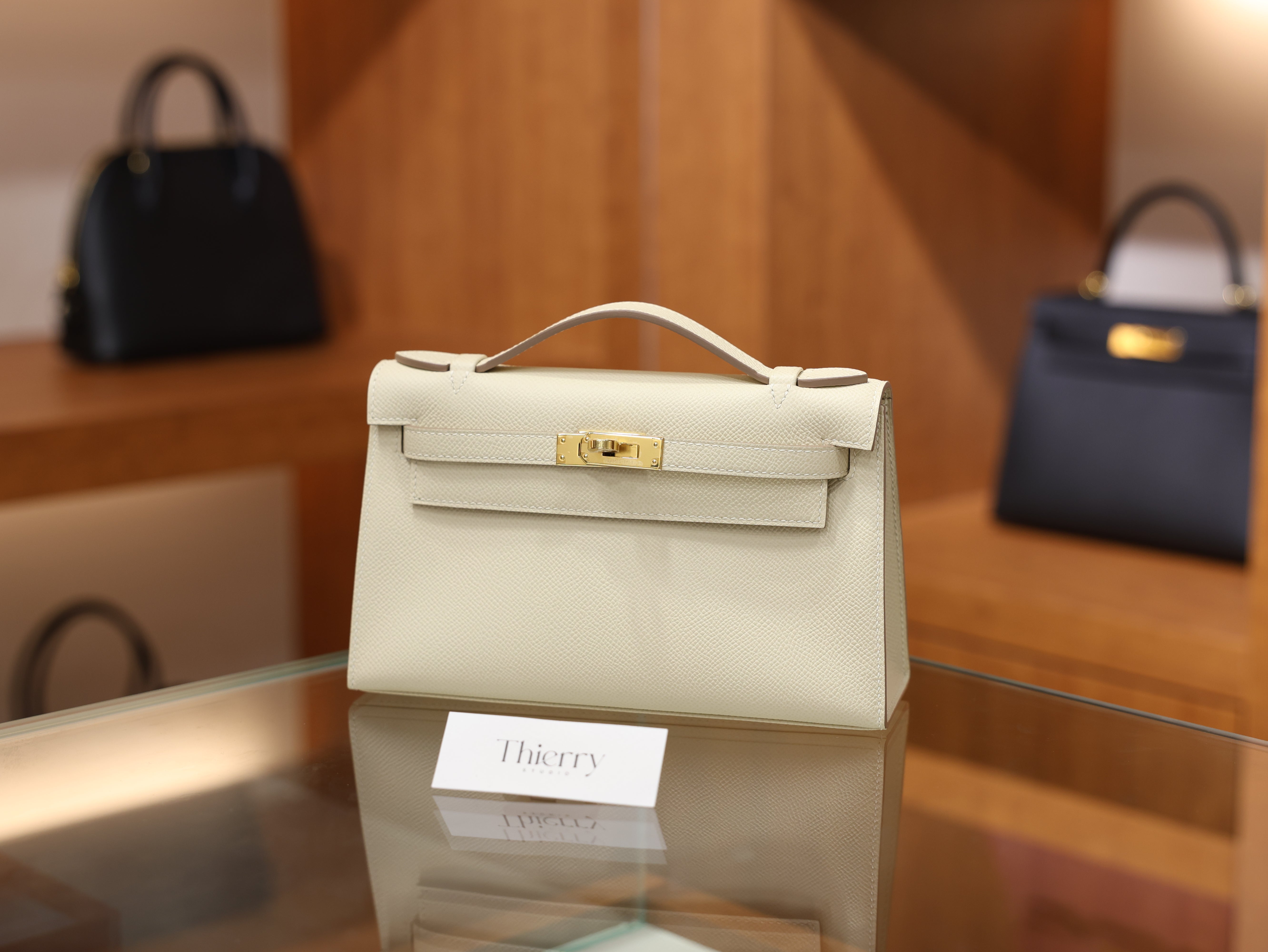 Kelly pochette epsom craie GHW