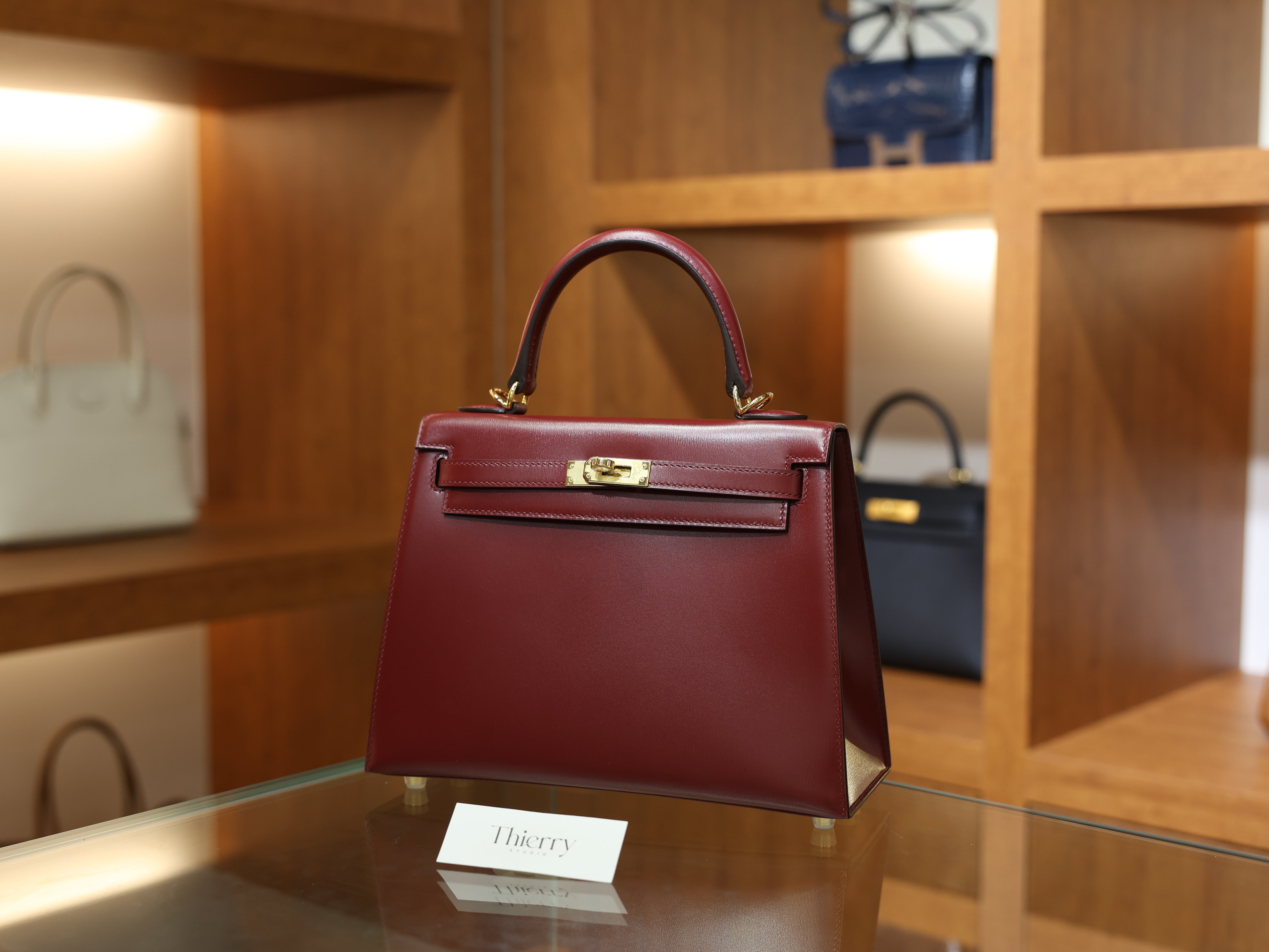 kelly 25 box sellier rouge H GHW