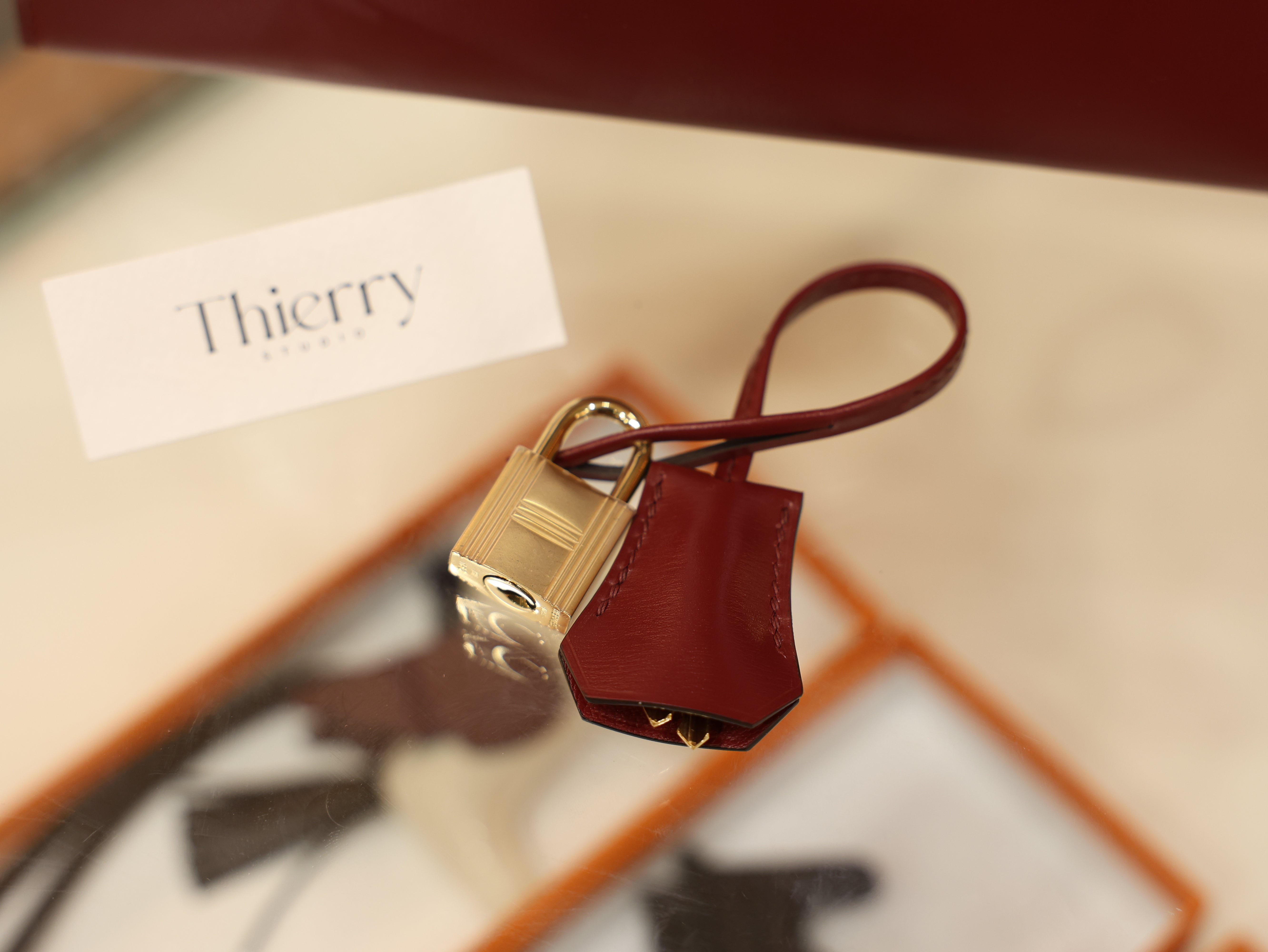 kelly 25 box sellier rouge H GHW