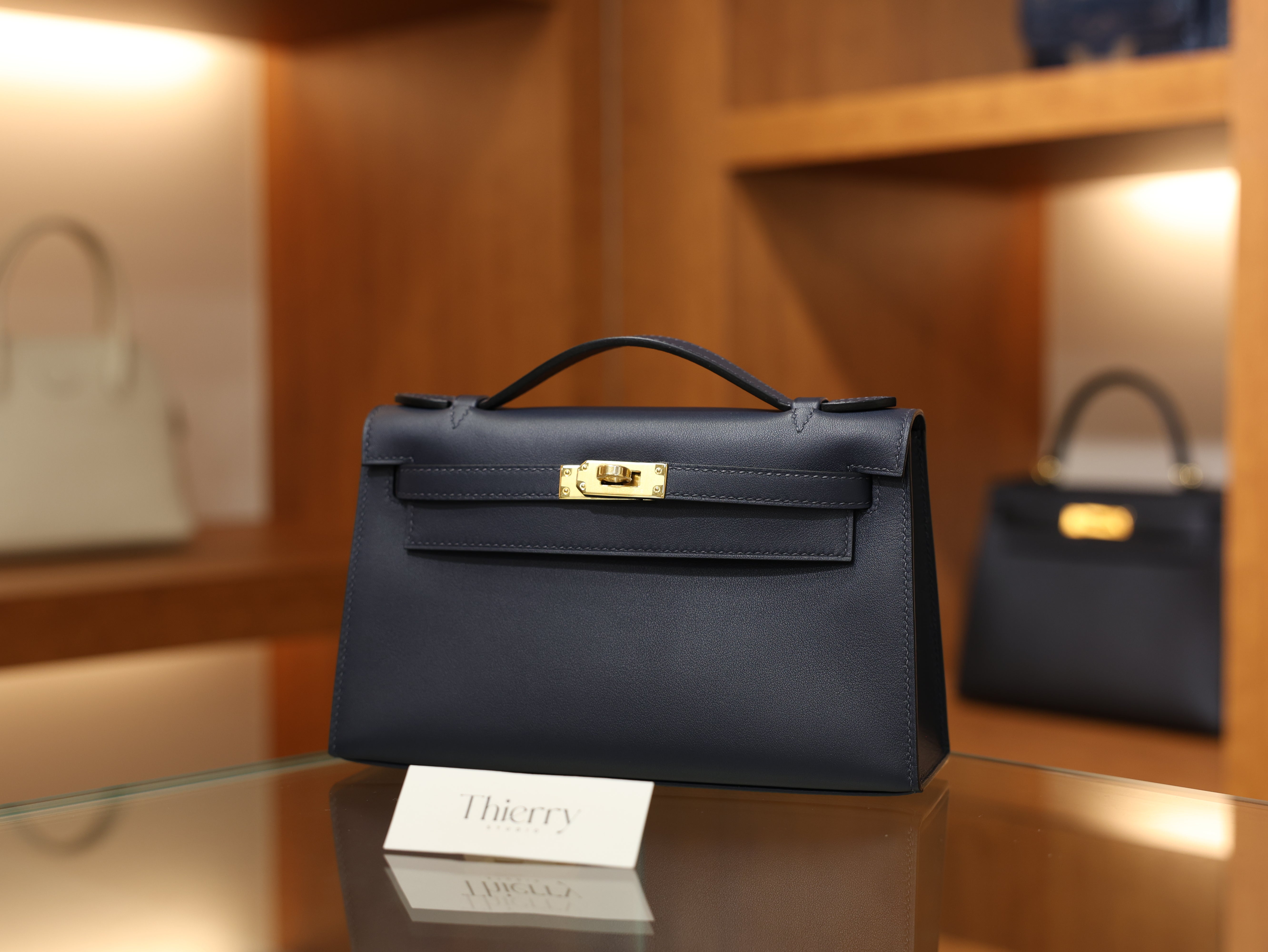 Kelly pochette swift blue nuit GHW