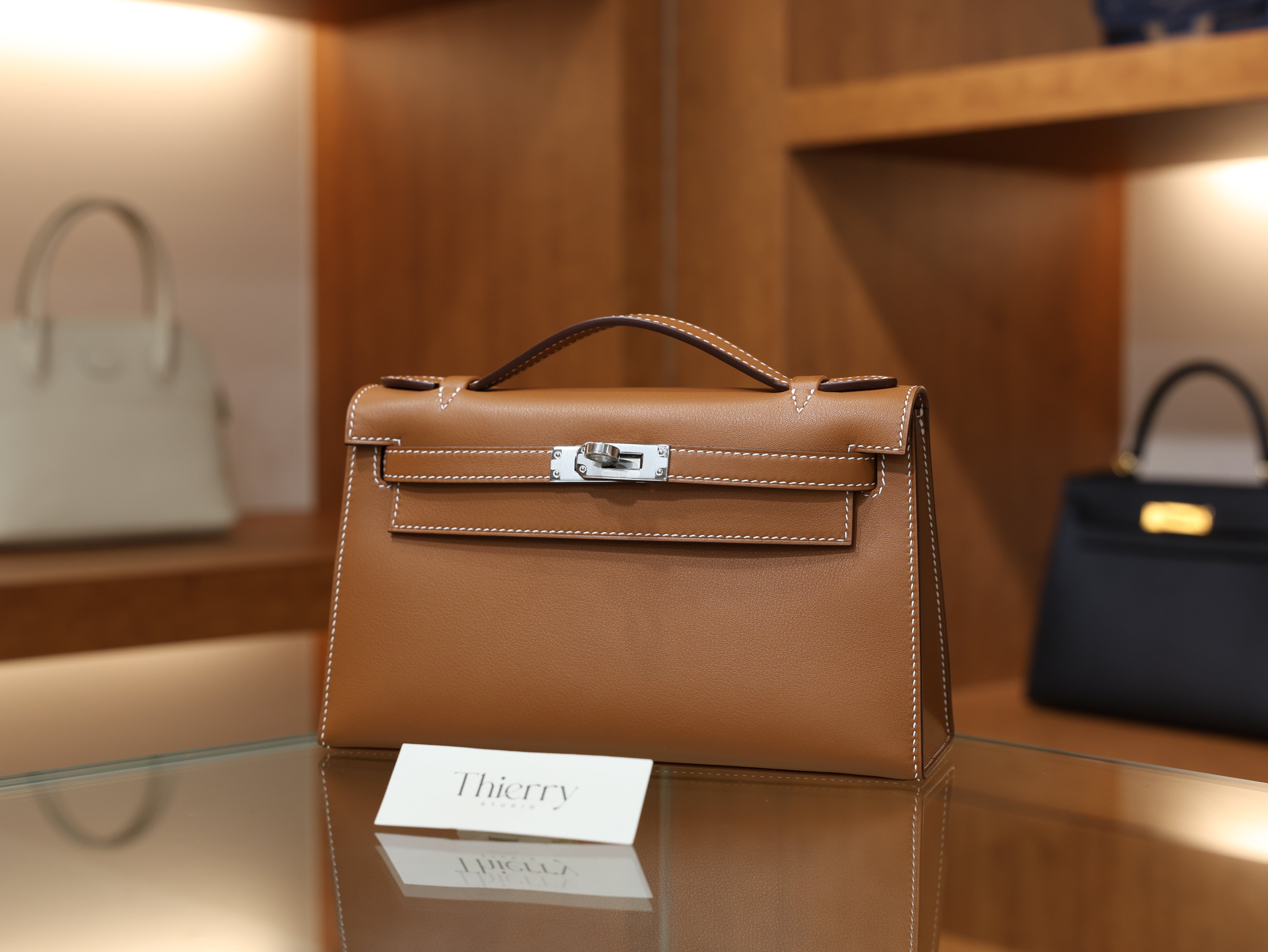 Kelly pochette swift gold PHW