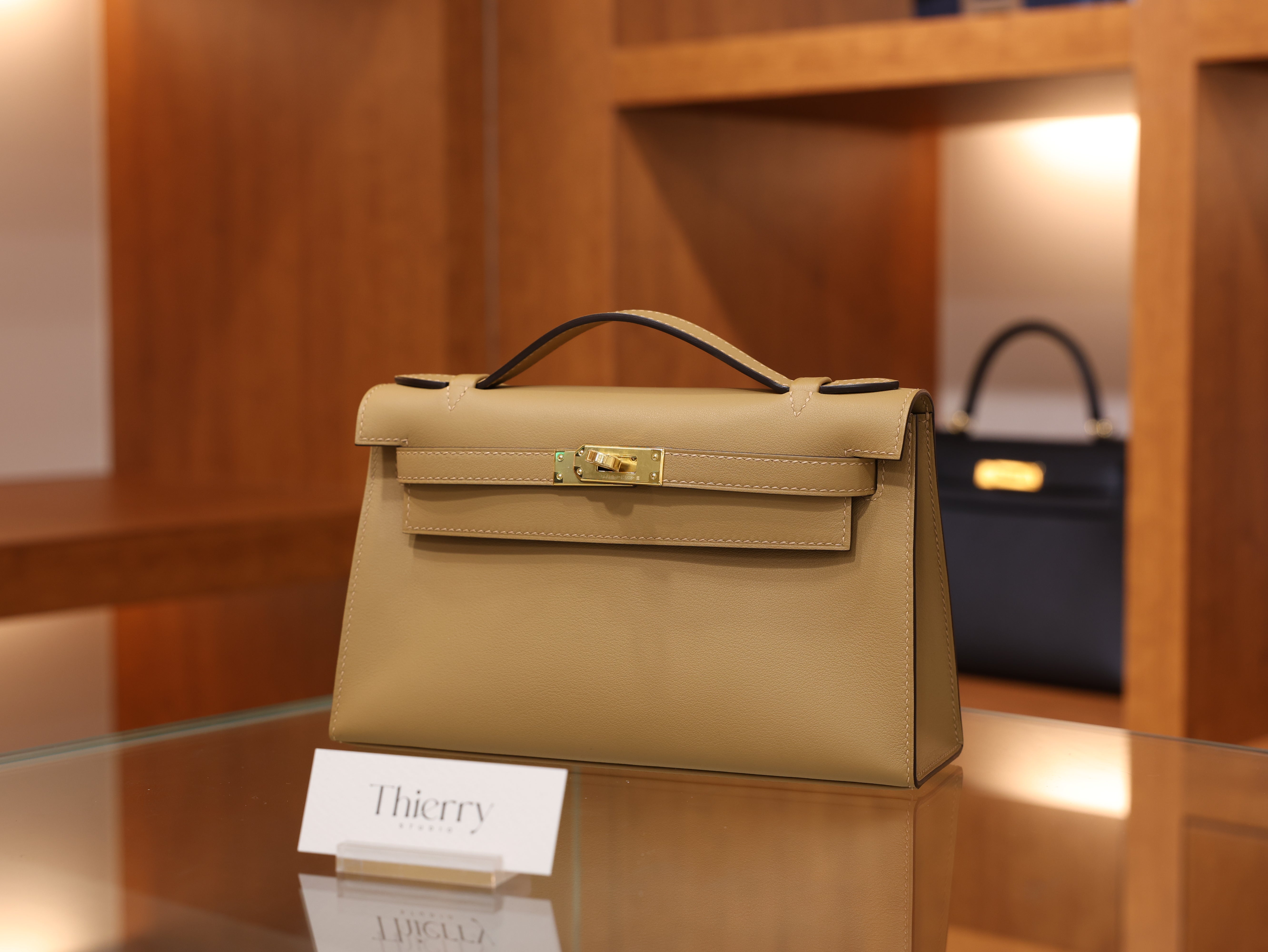 Kelly pochette swift chai GHW