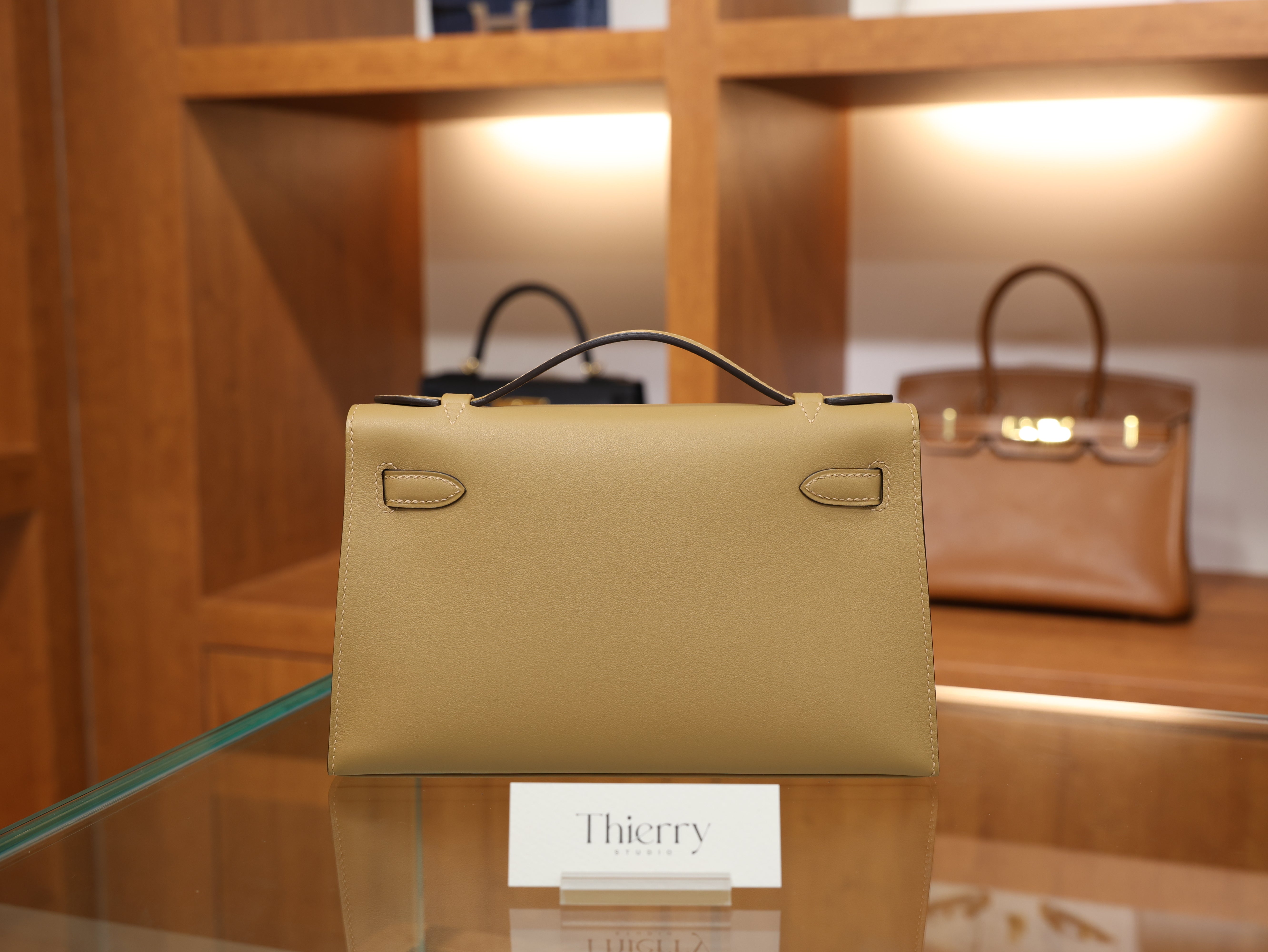 Kelly pochette swift chai GHW