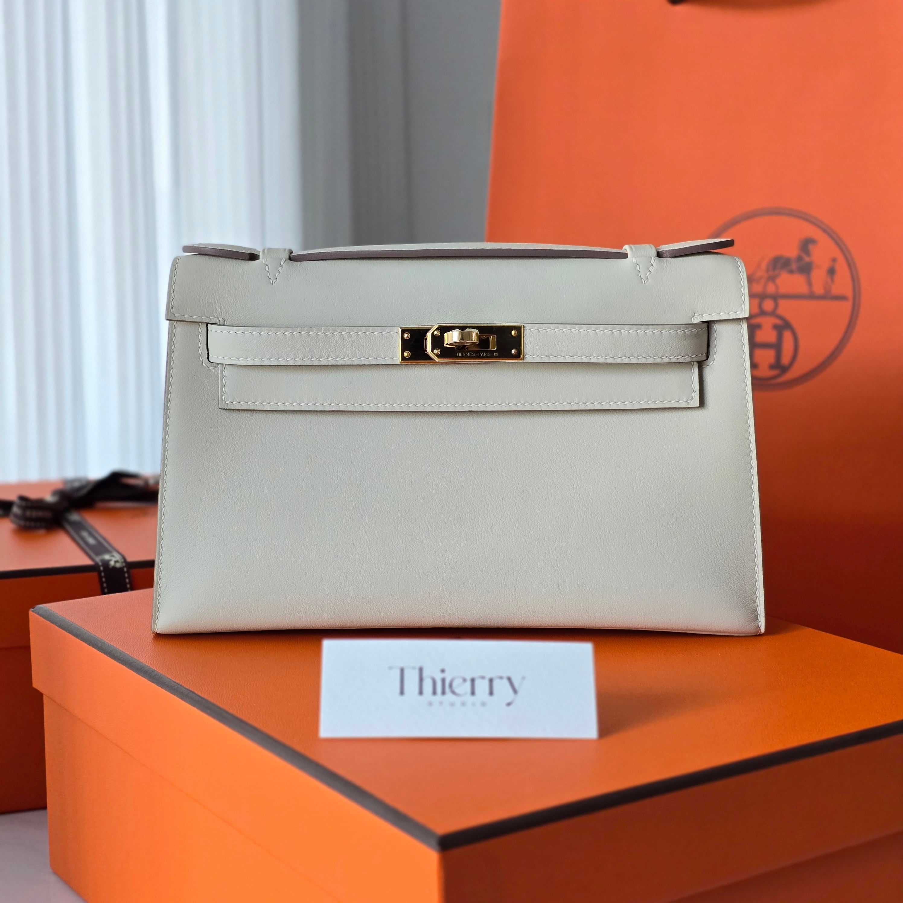 Kelly pochette swift craie GHW