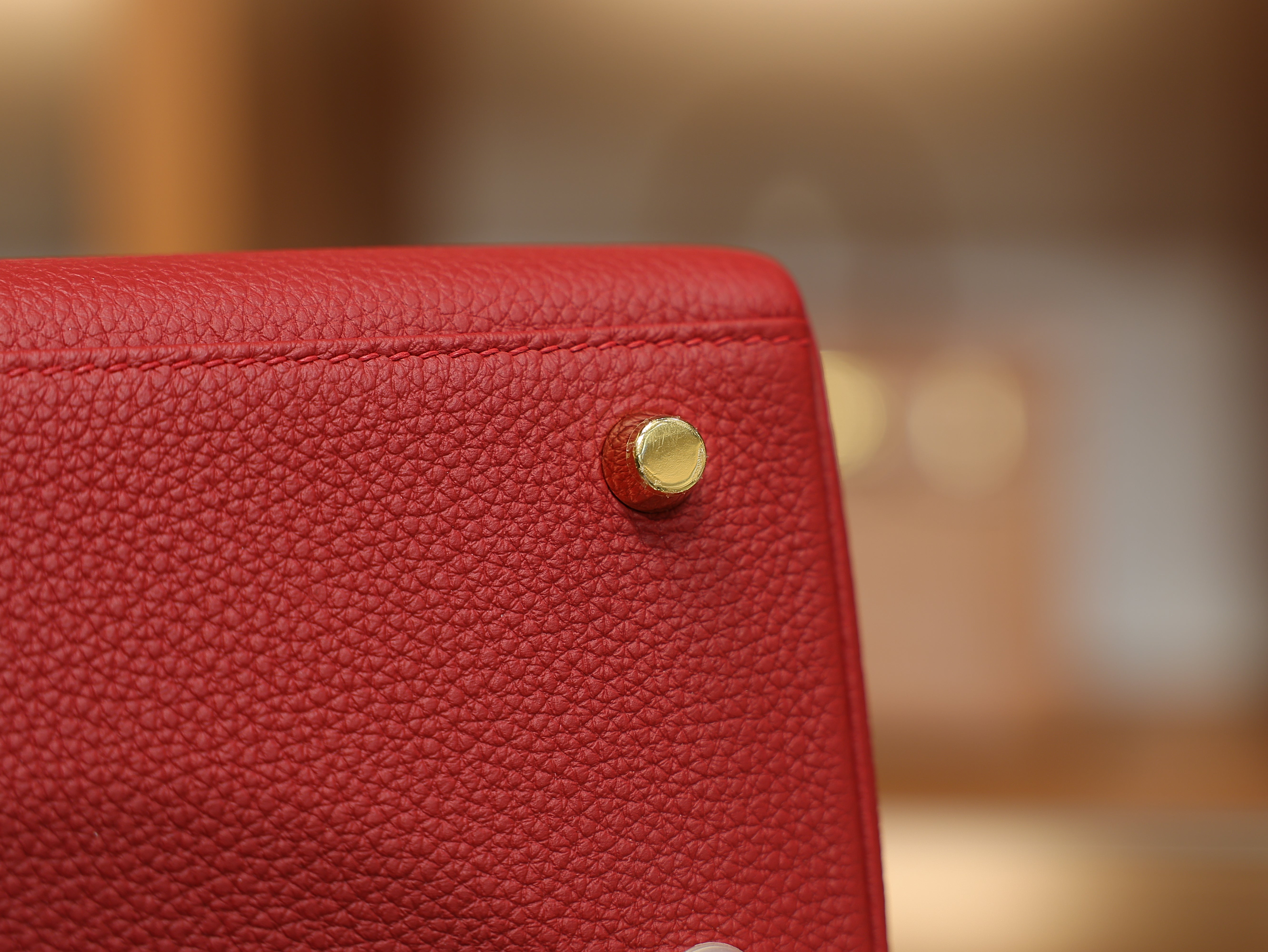 Kelly 25 togo rouge casaque GHW