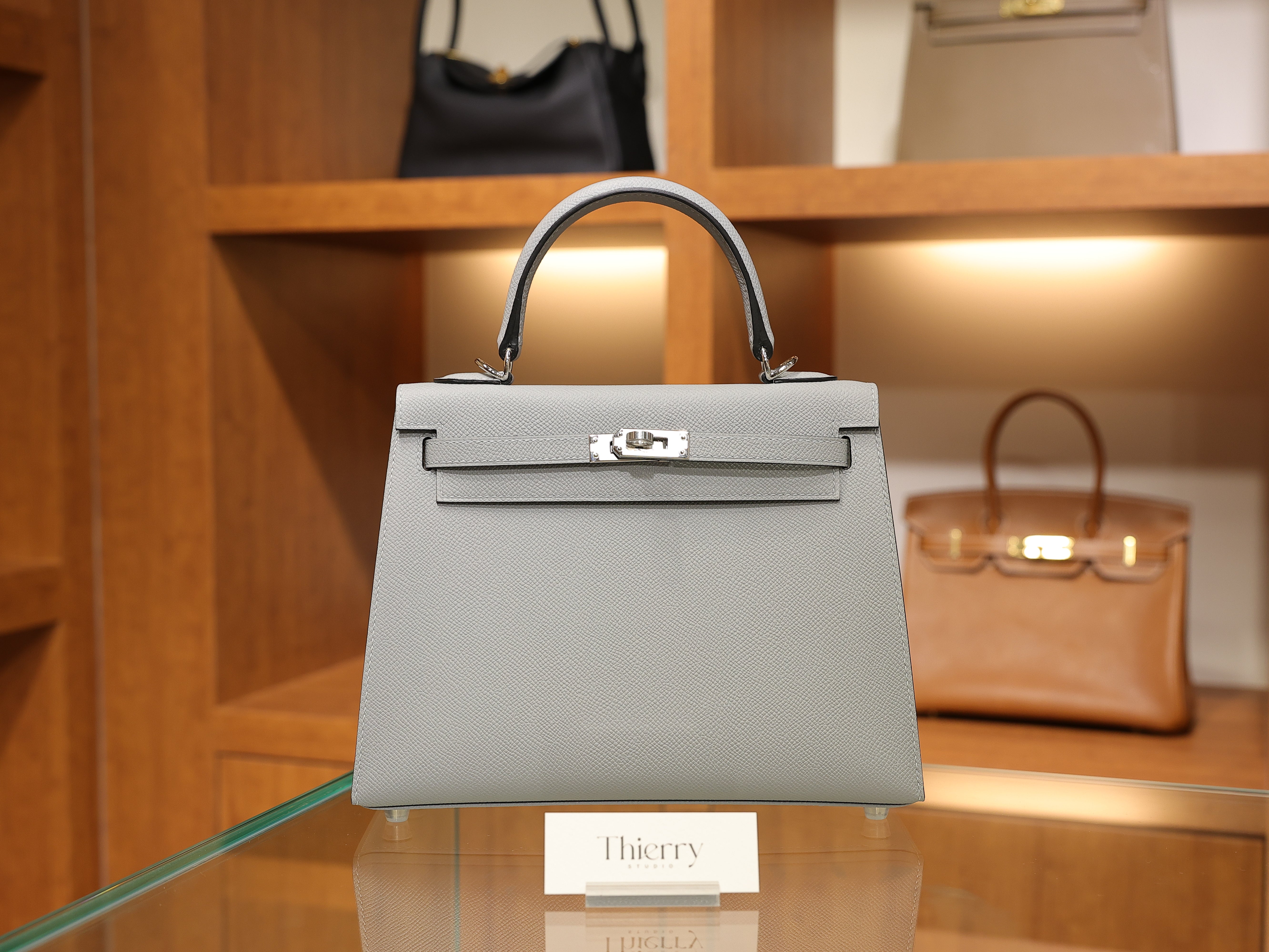 Kelly 25 epsom gris pantin PHW