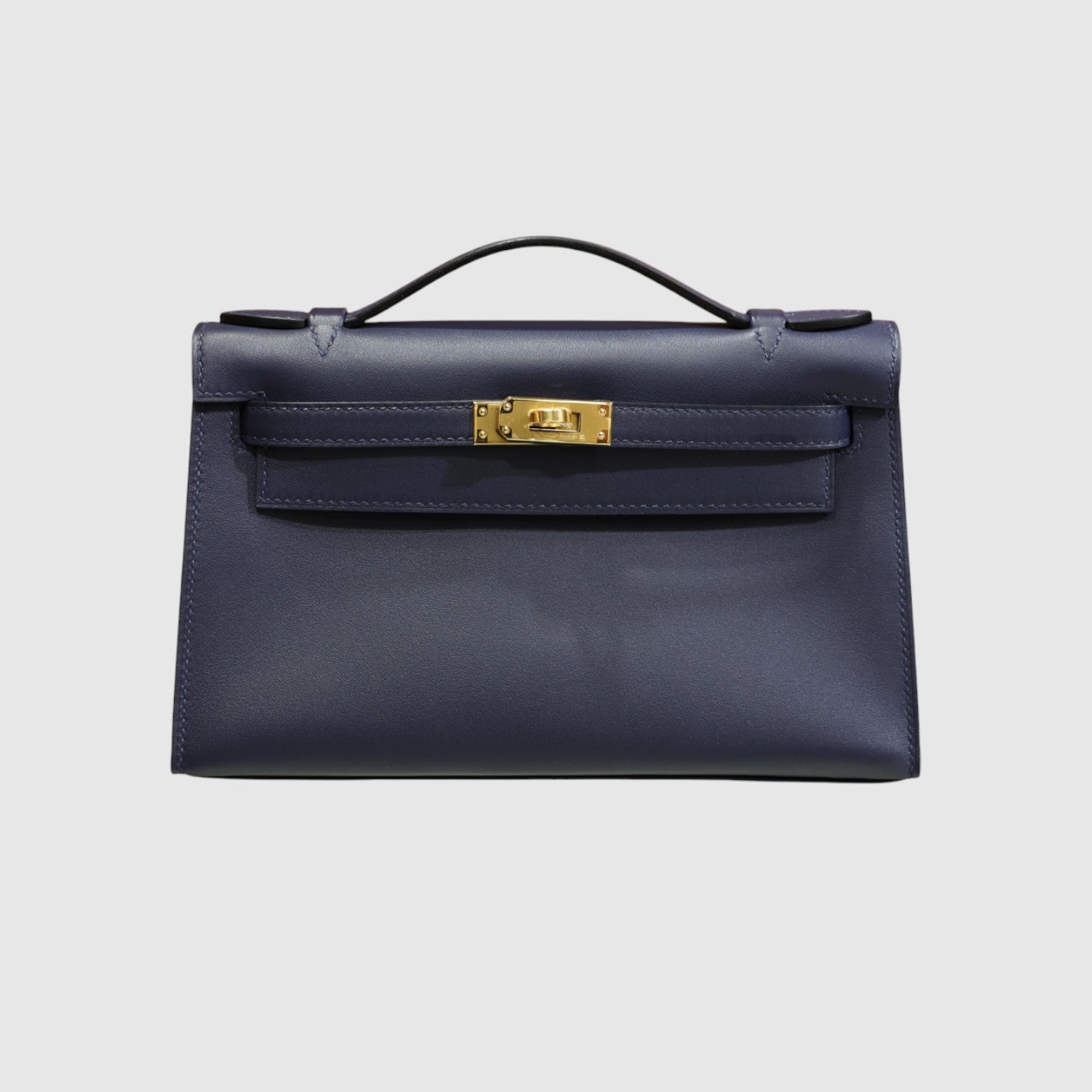 Kelly pochette swift bleu saphir GHW