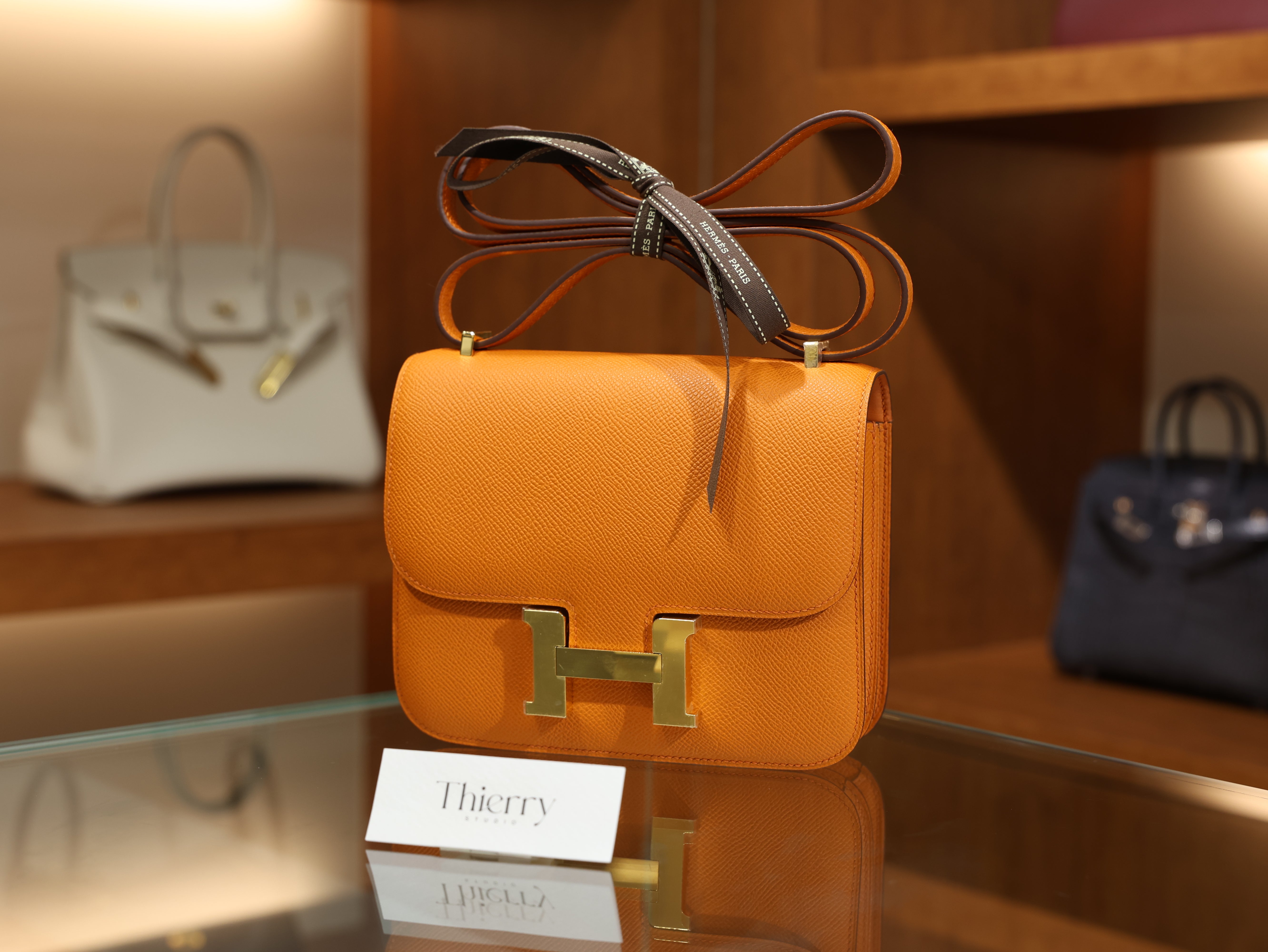 Constance 18 epsom orange GHW