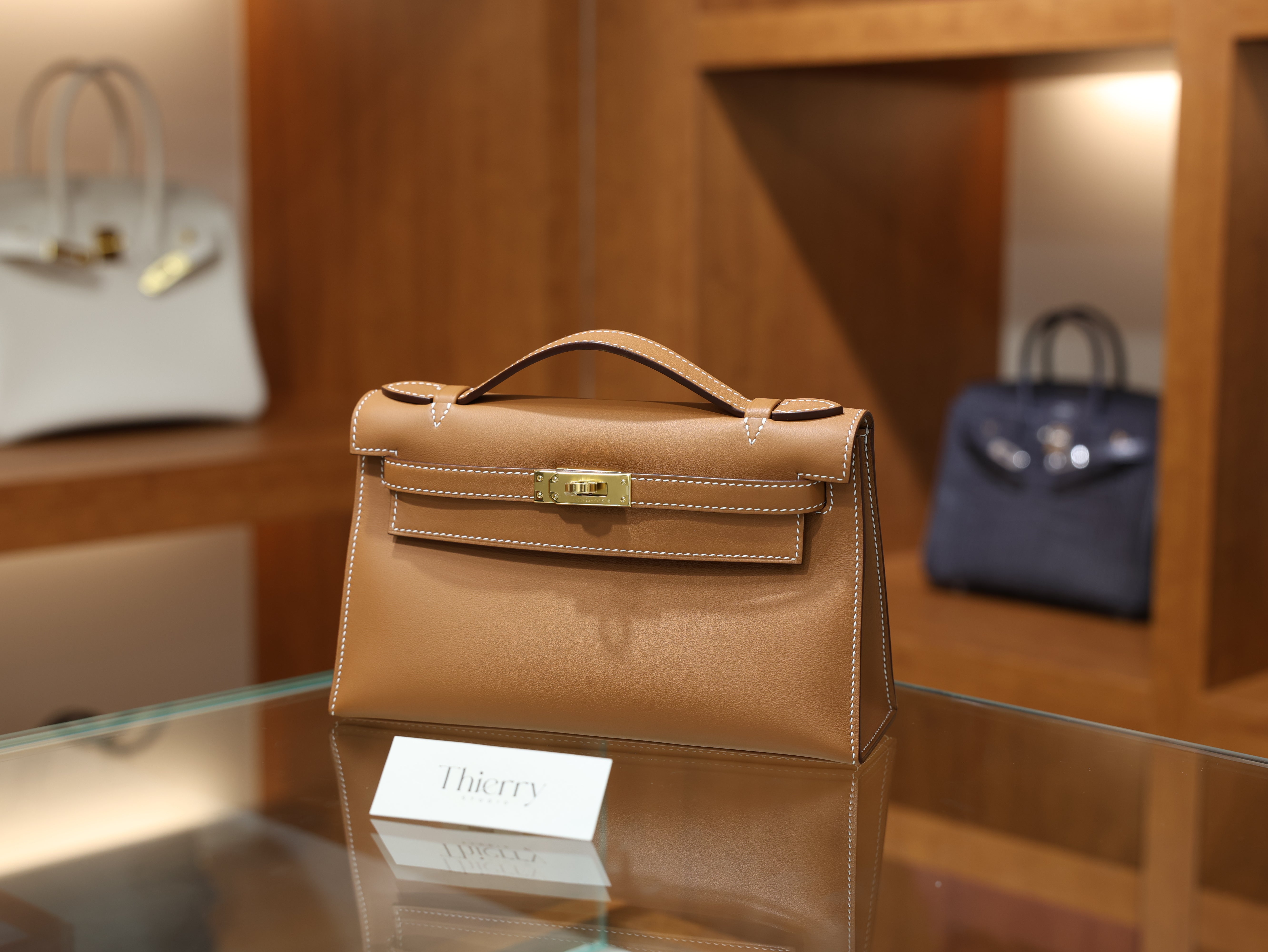 Kelly pochette swift gold GHW