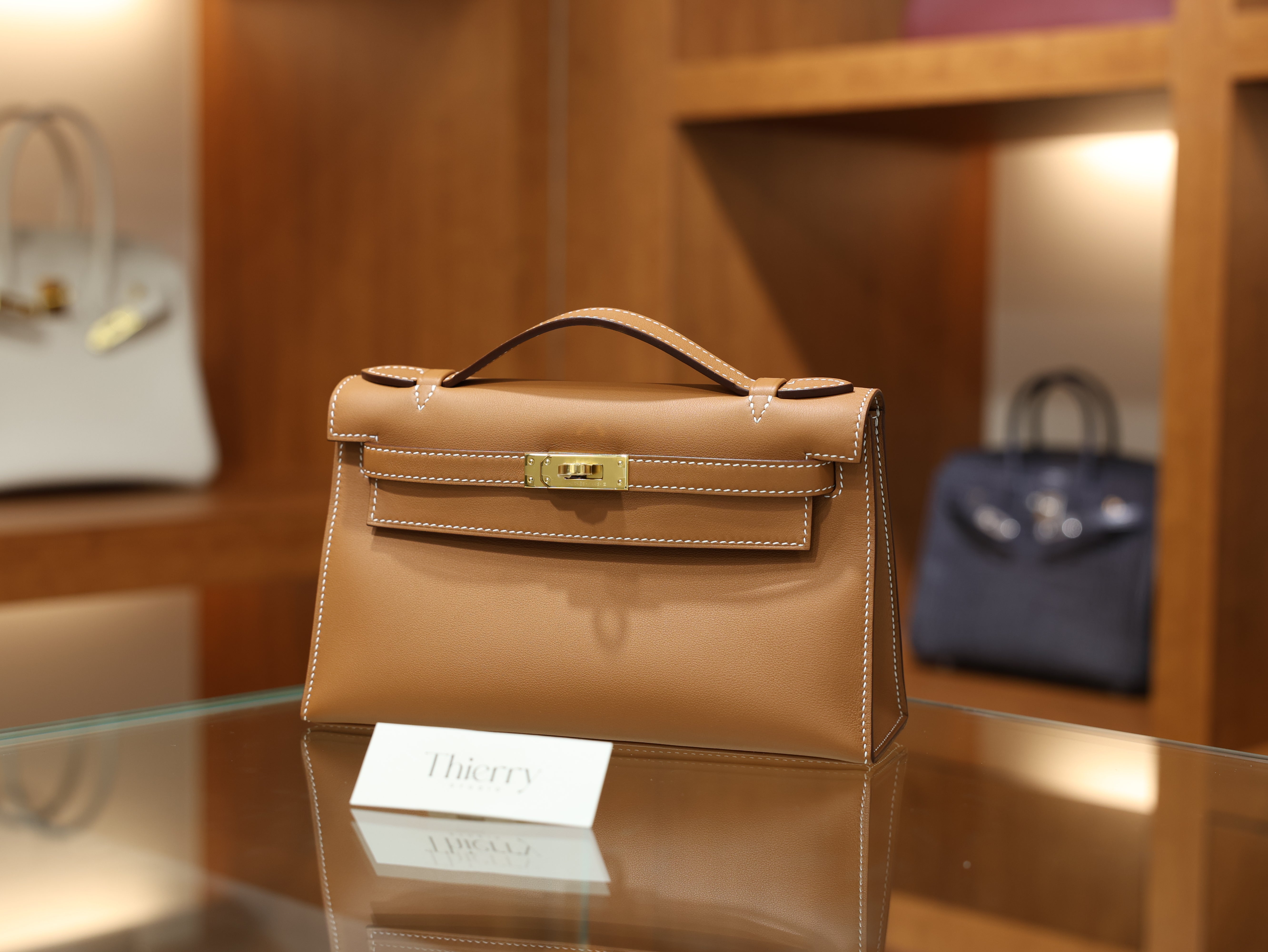 Kelly pochette swift gold GHW