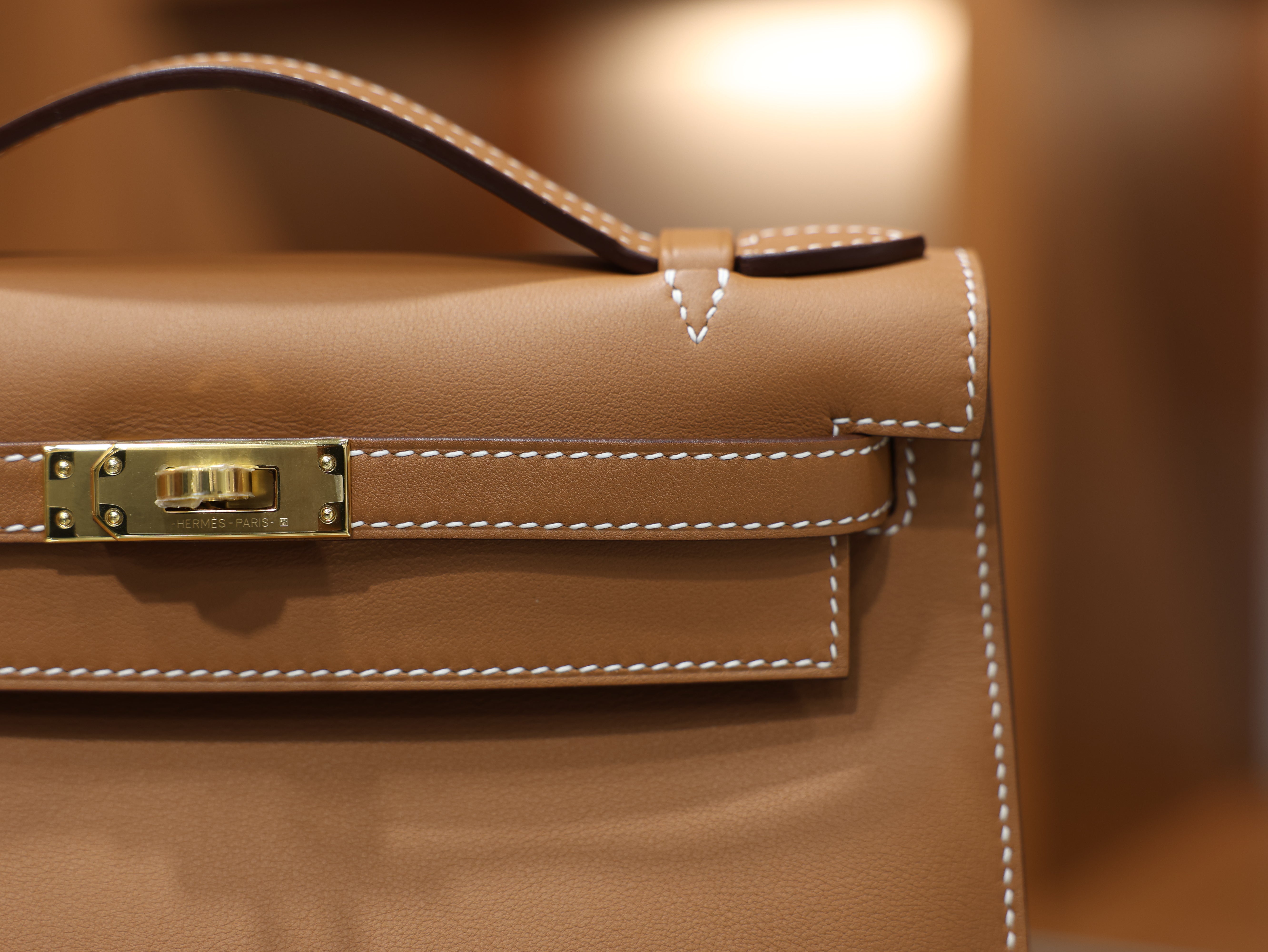 Kelly pochette swift gold GHW