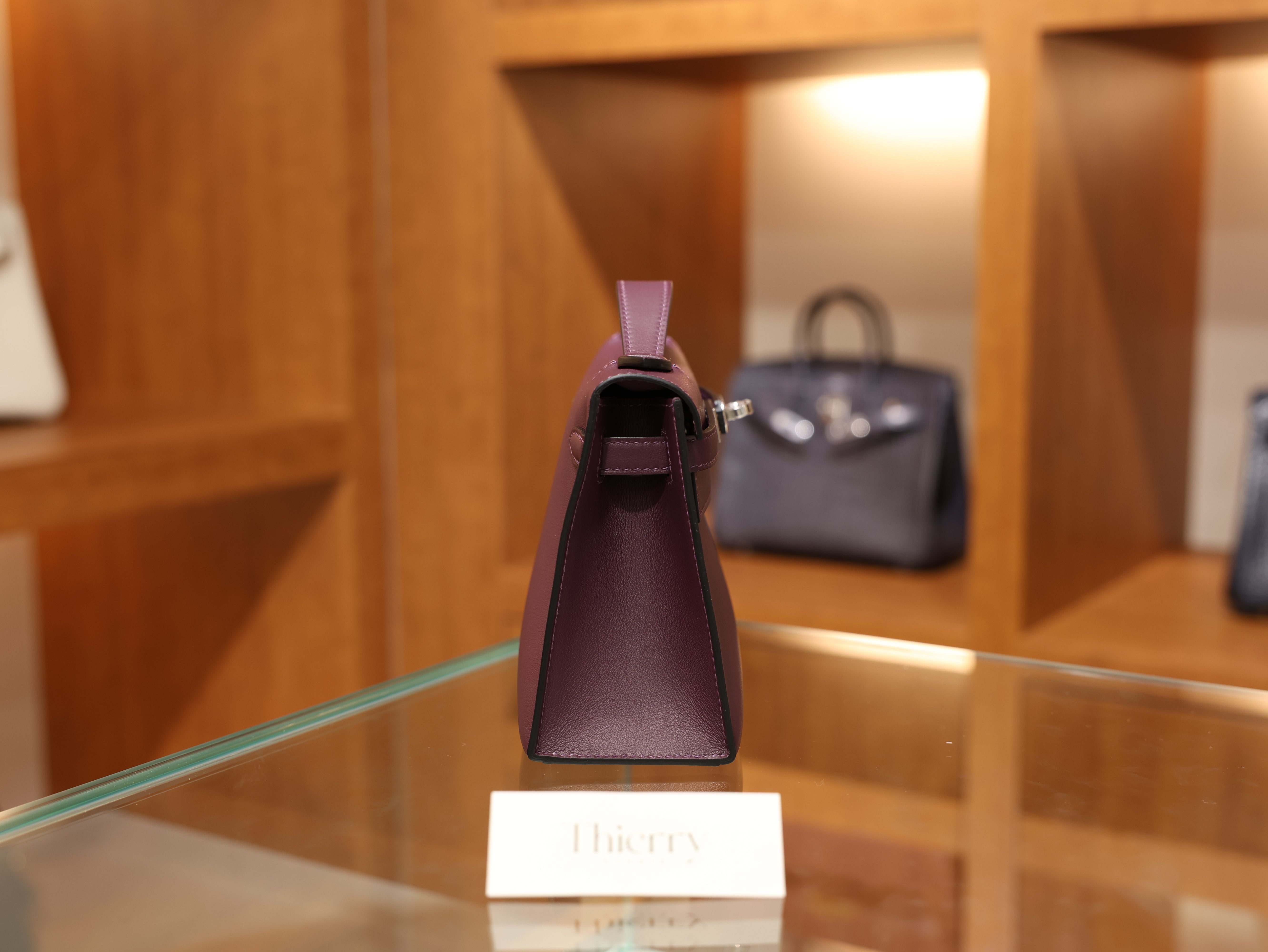 Kelly pochette swift casis PHW