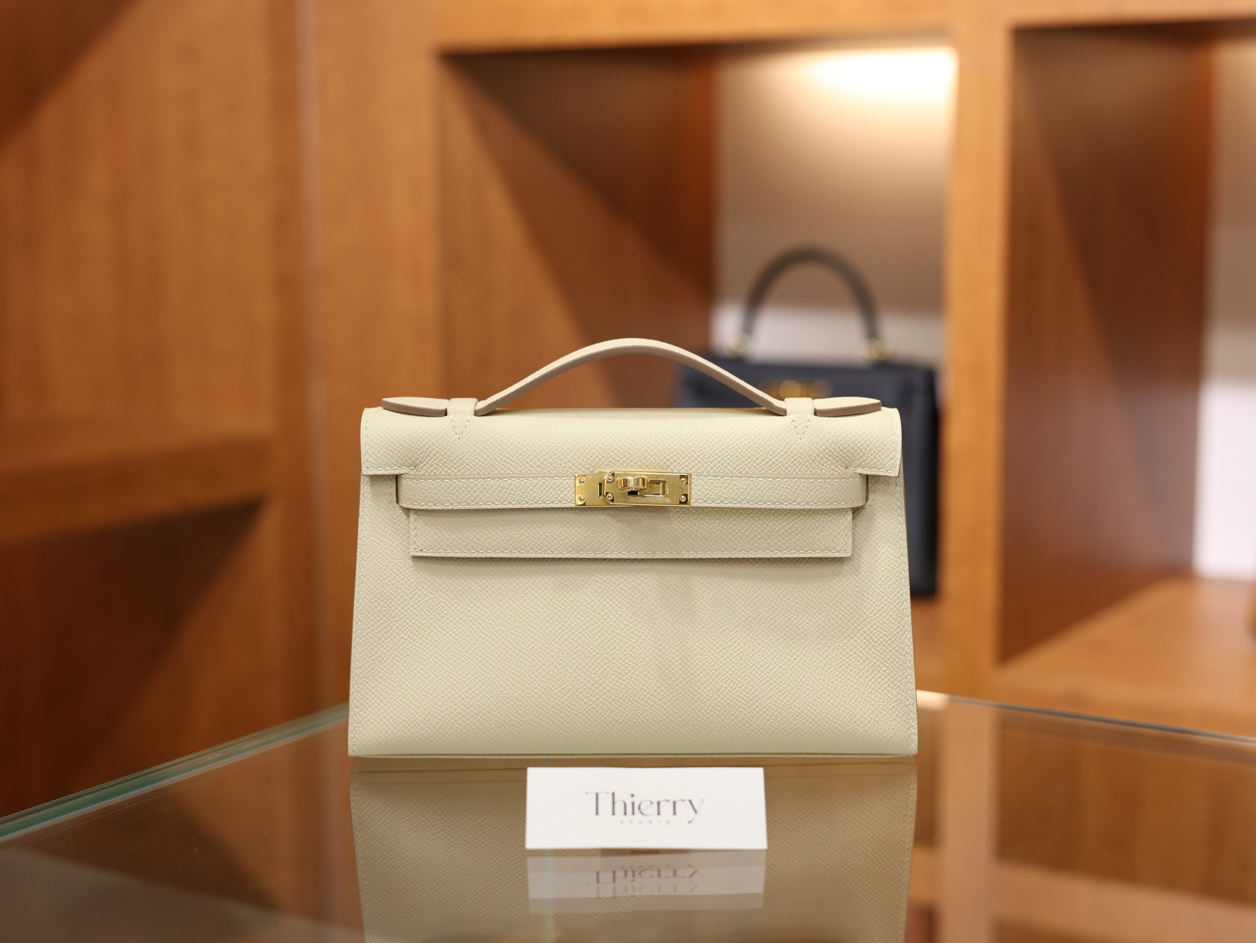 Kelly pochette epsom craie GHW