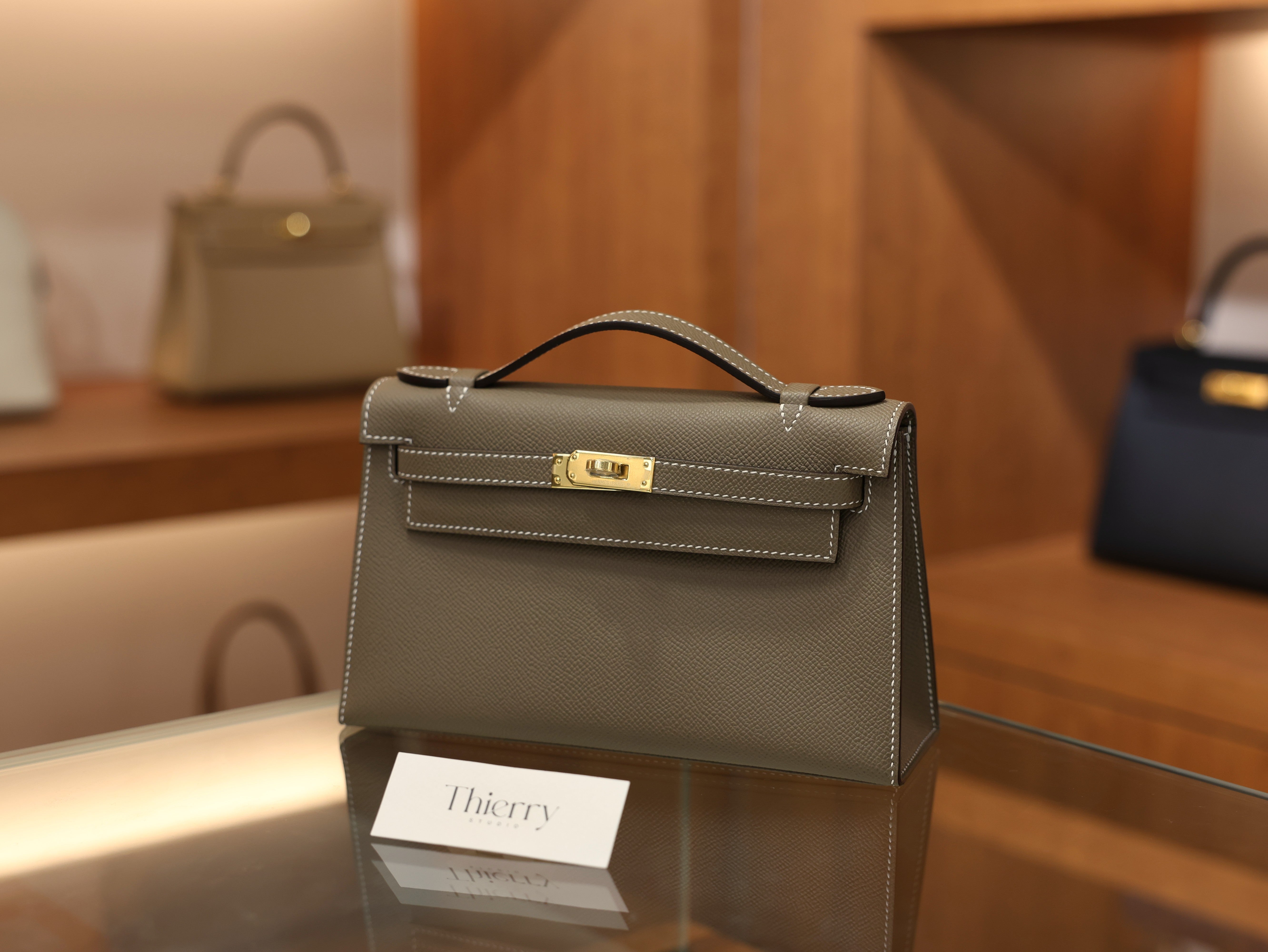 Kelly pochette epsom etoupe GHW (HSS)