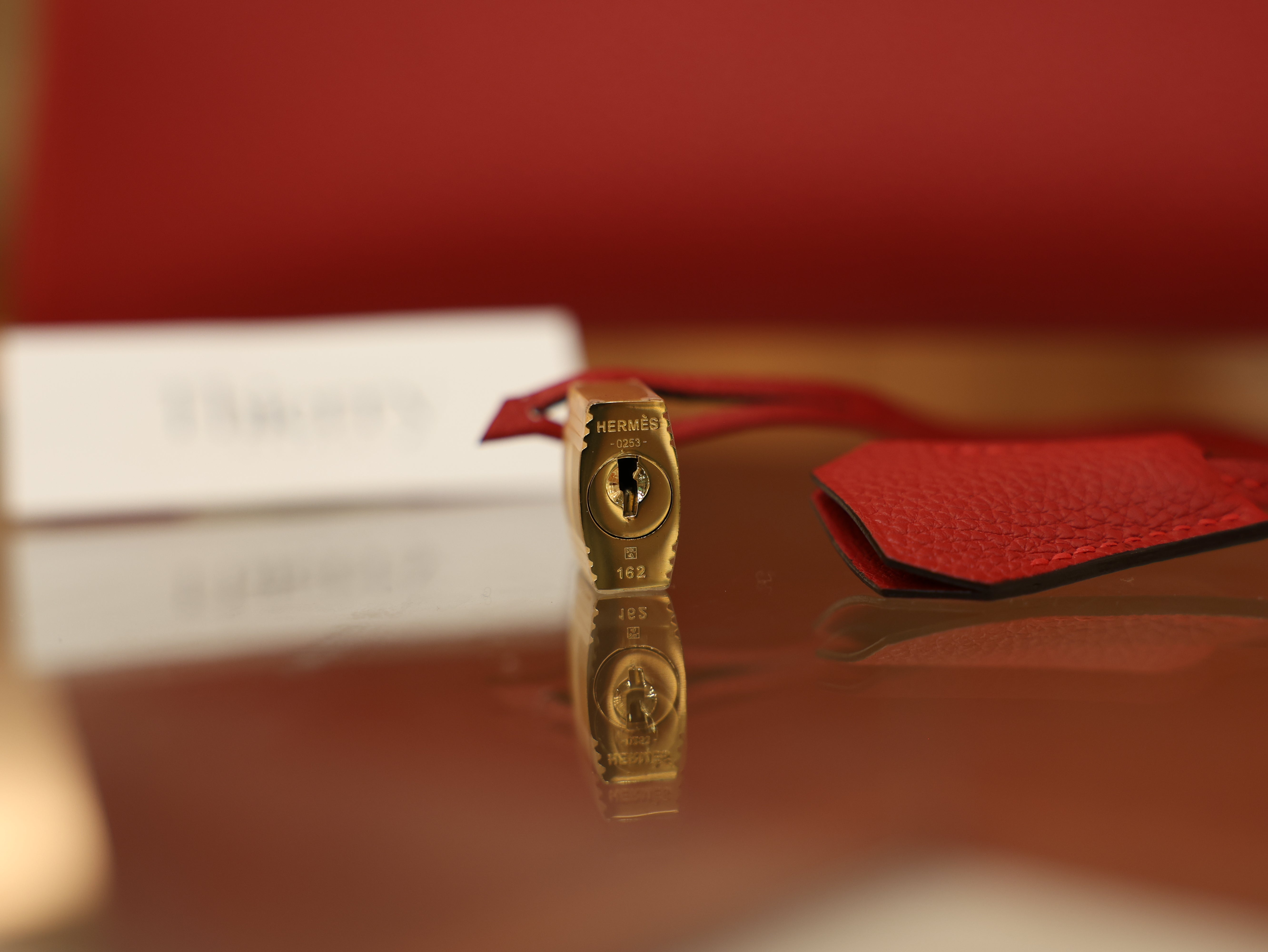 Birkin 30 togo rouge casaque GHW