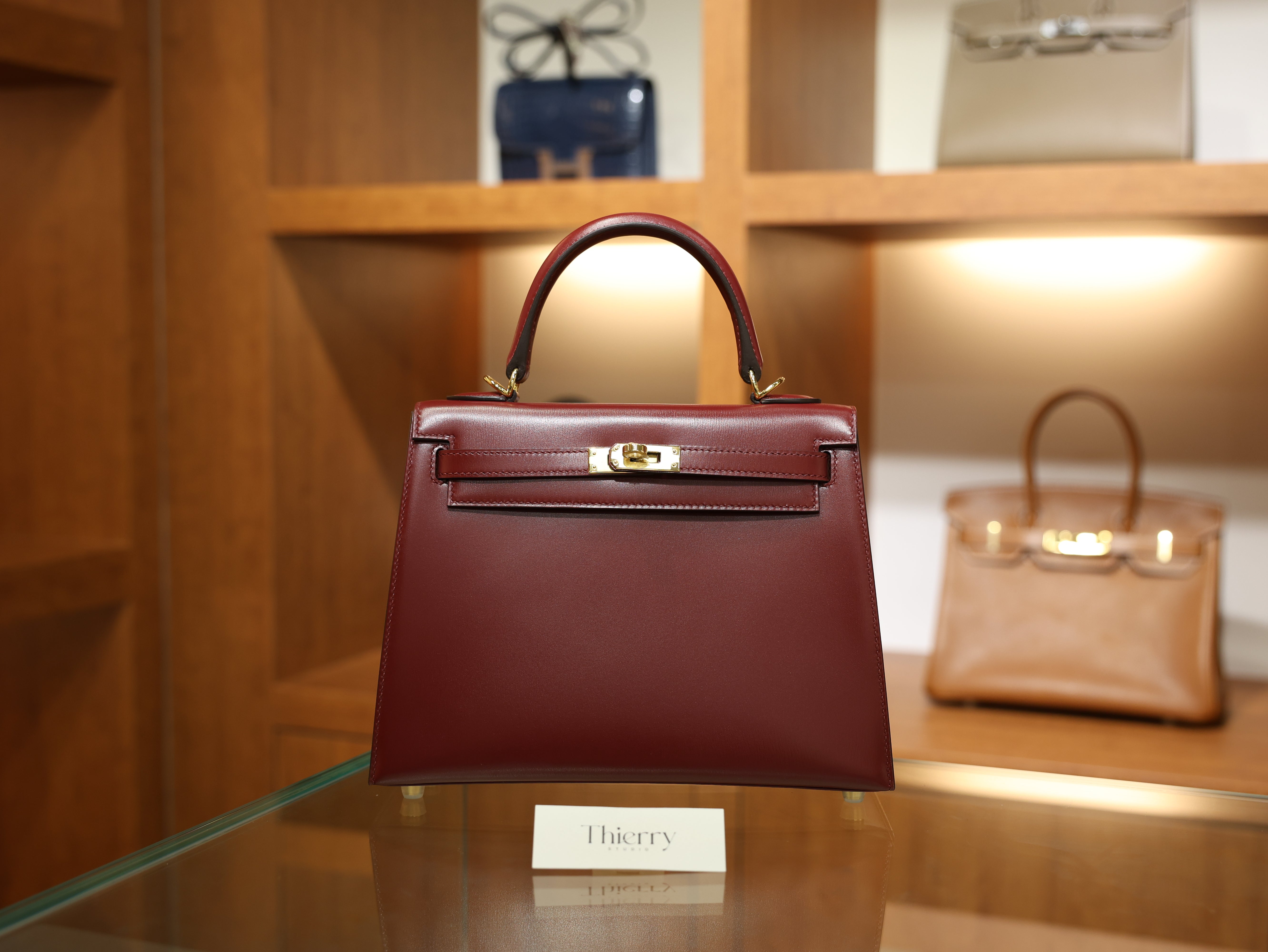 kelly 25 box sellier rouge H GHW