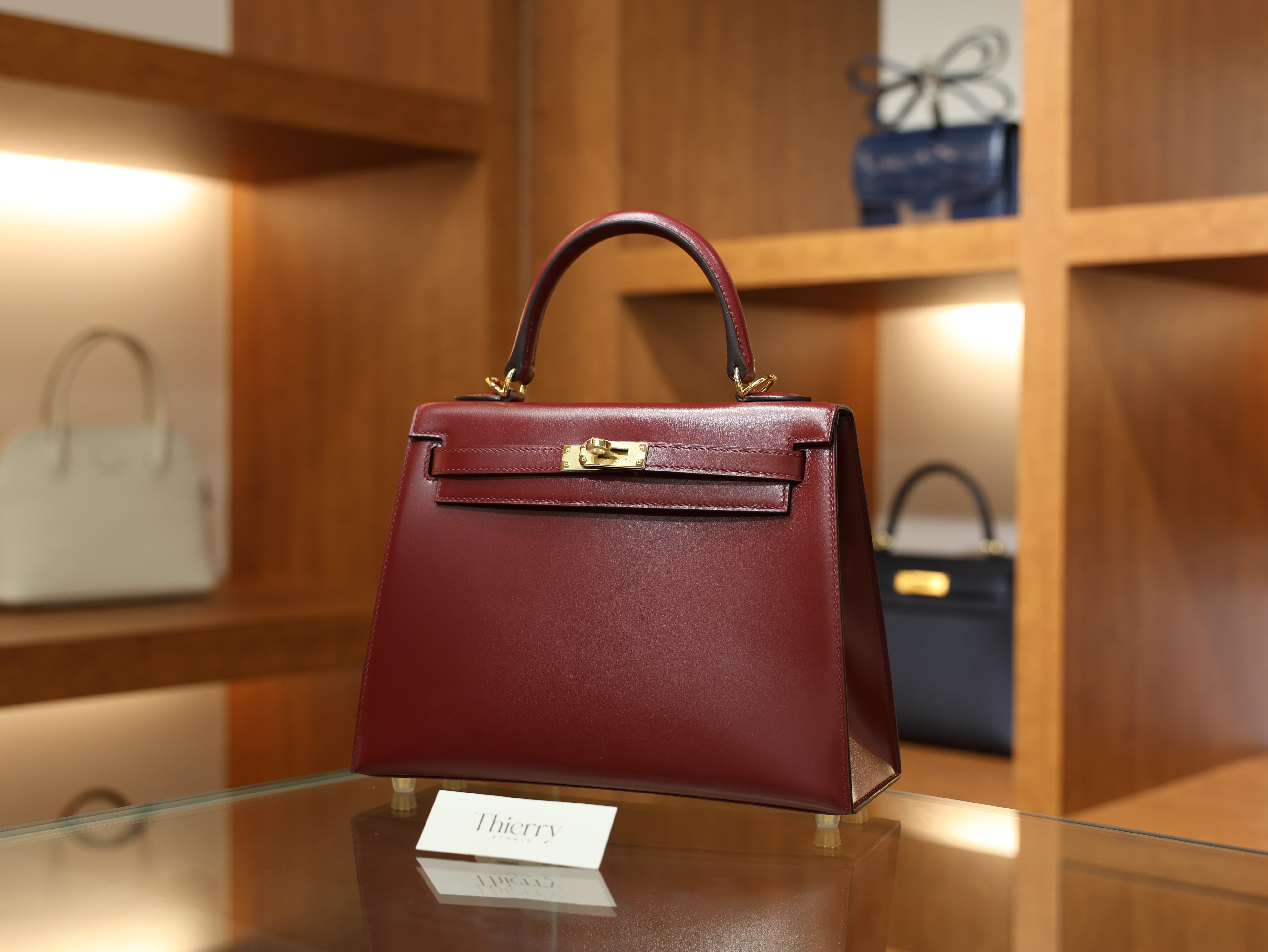 kelly 25 box sellier rouge H GHW