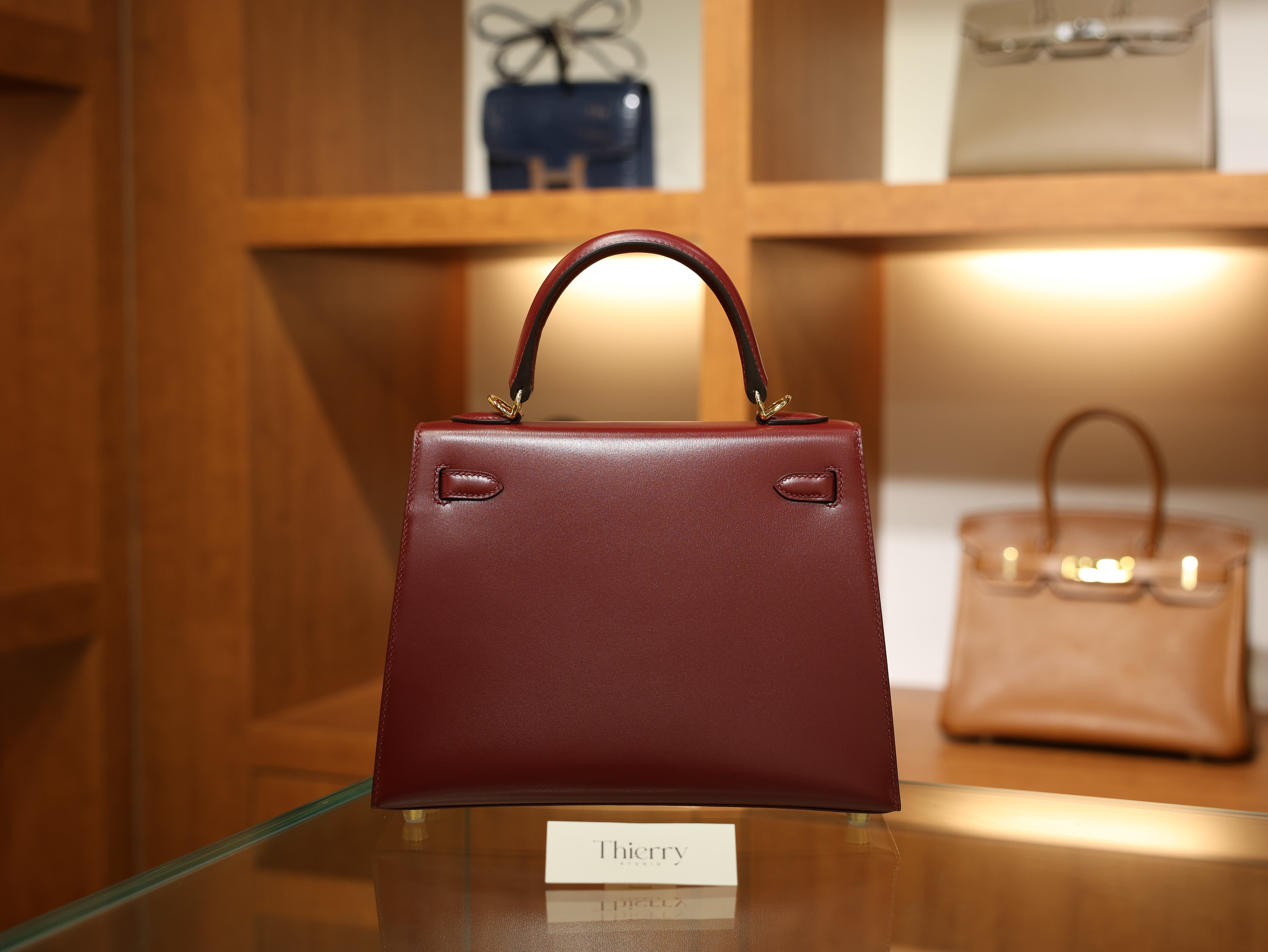 kelly 25 box sellier rouge H GHW