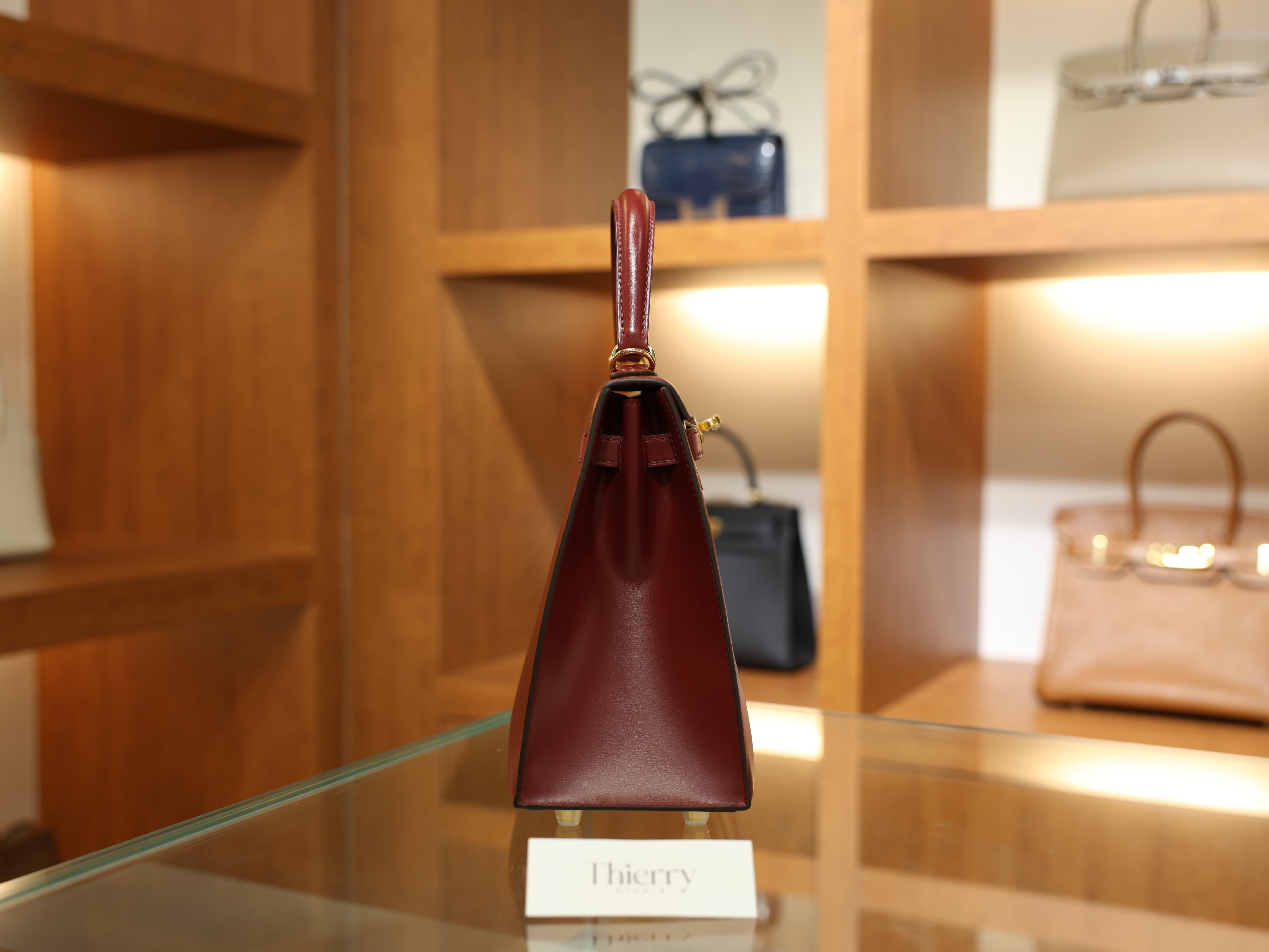 kelly 25 box sellier rouge H GHW