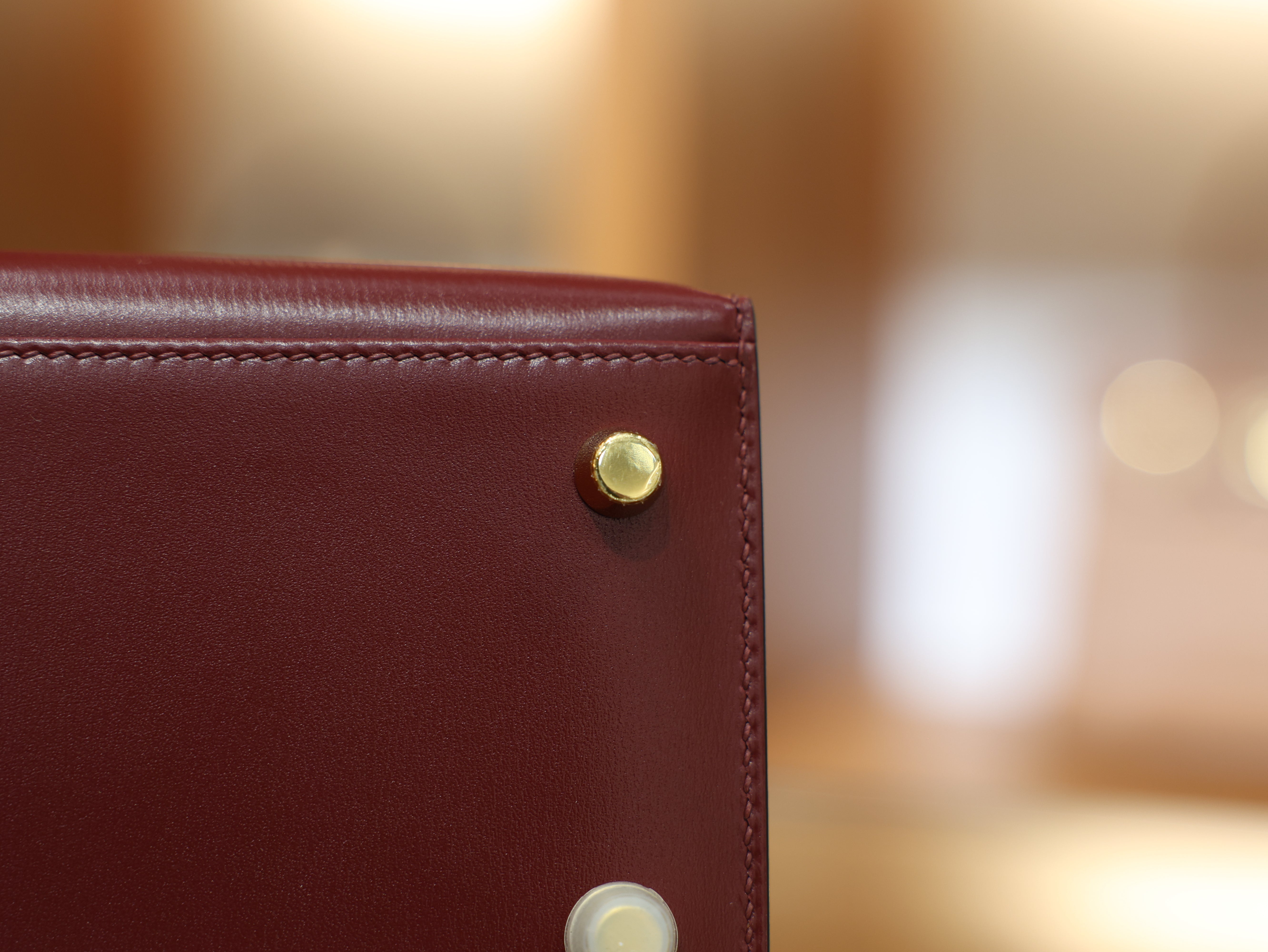 kelly 25 box sellier rouge H GHW