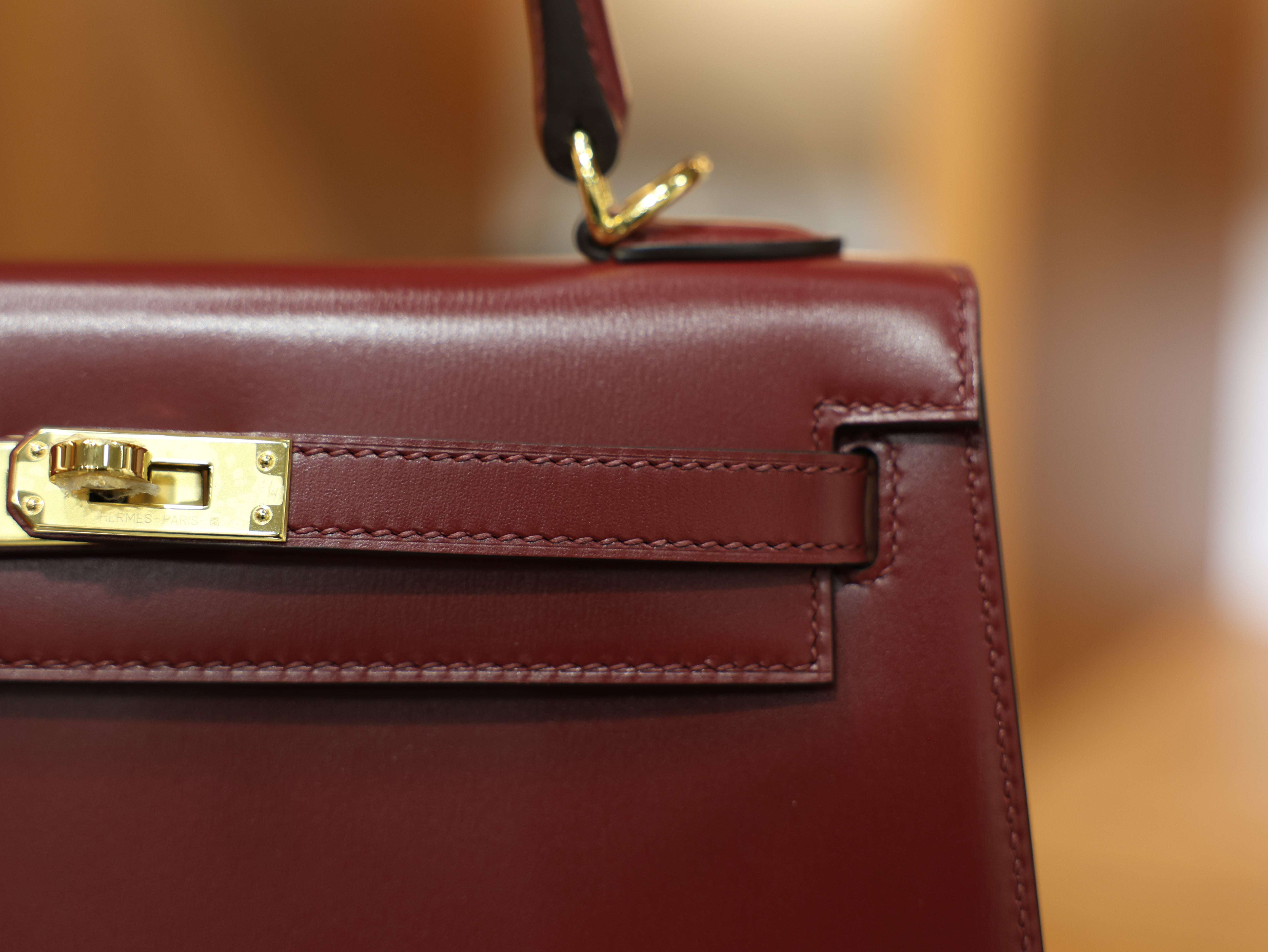 kelly 25 box sellier rouge H GHW