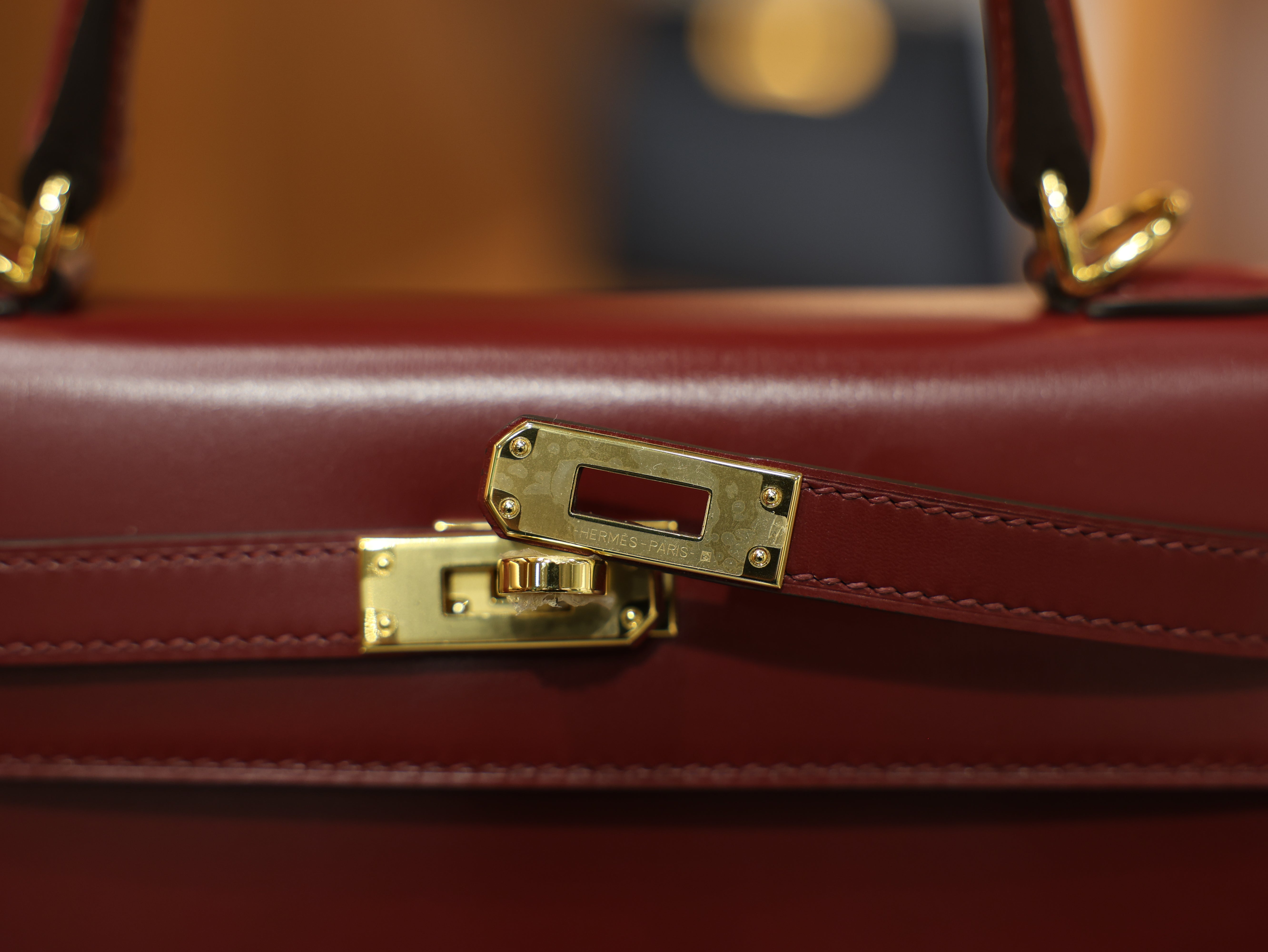 kelly 25 box sellier rouge H GHW